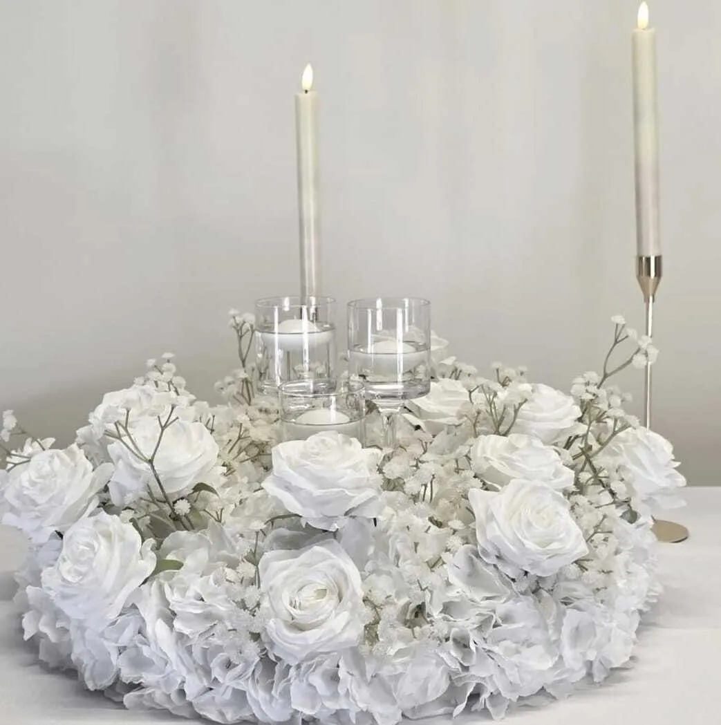 Tall stem vases with candles