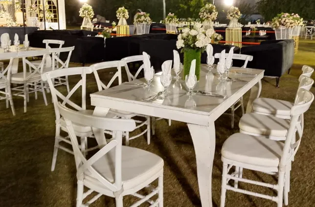 white cross back chairs