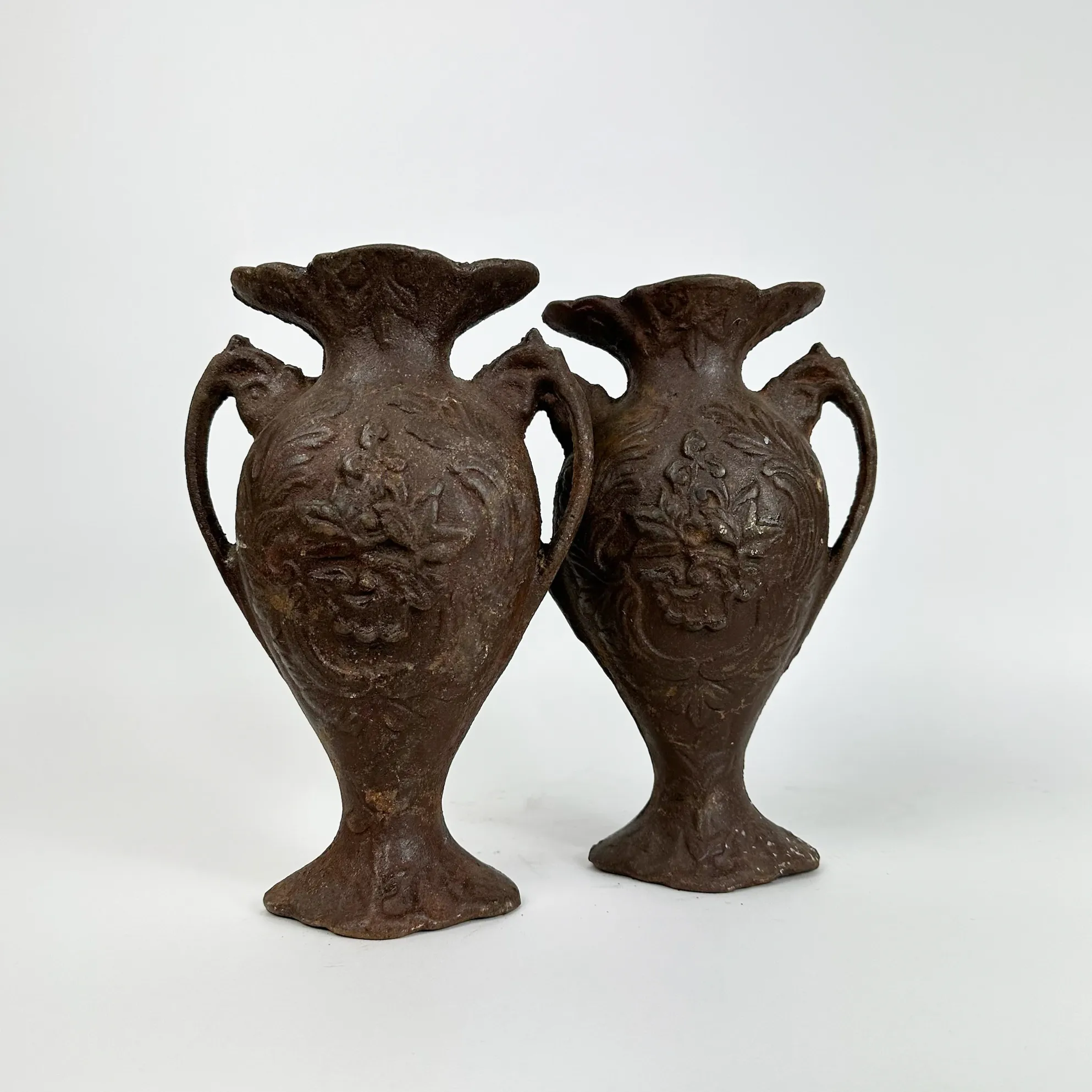 CAST IRON VASE PAIR
