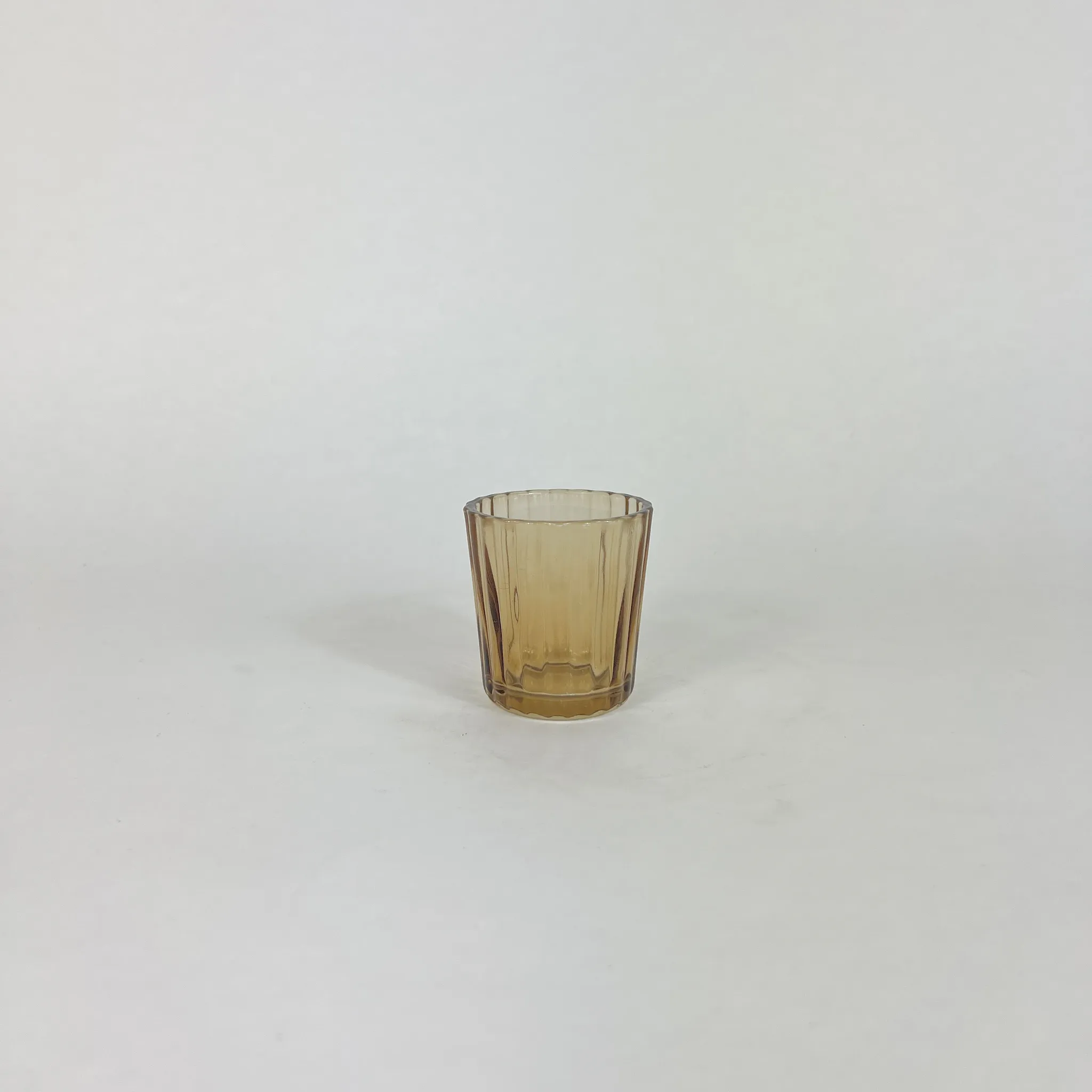 LIGHT AMBER FLUTED GLASS VOTIVE HOLDER