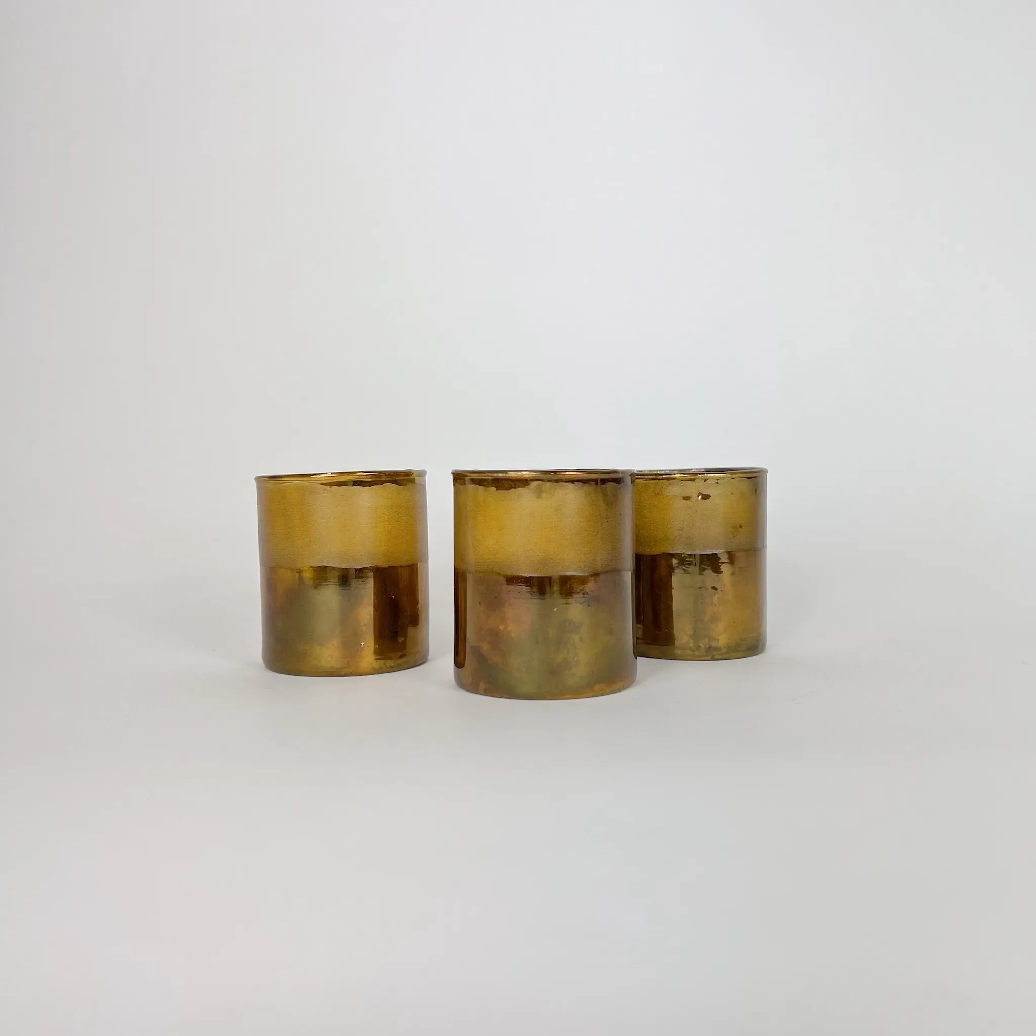 GOLD AND GLASS VOTIVE HOLDER