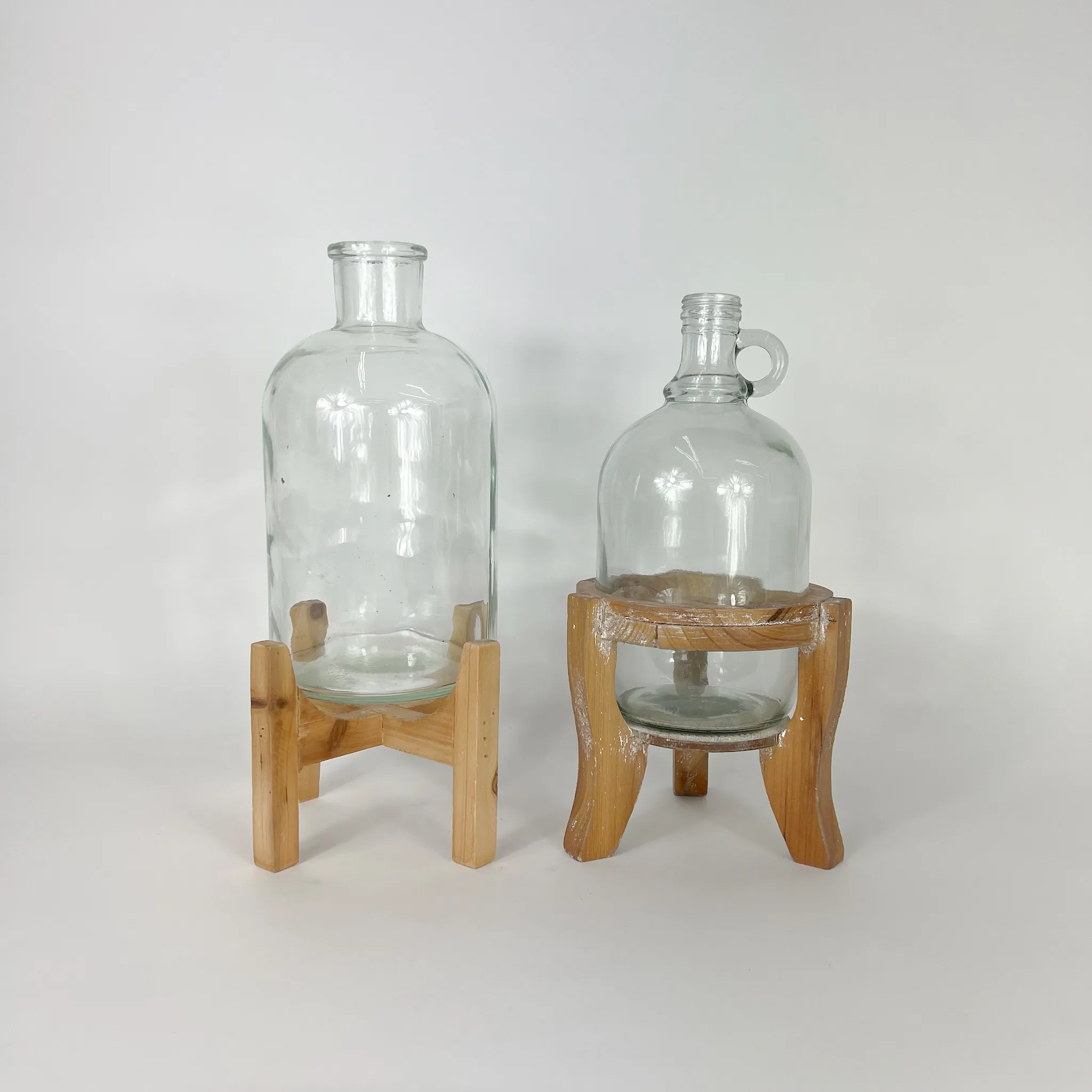 BOTTLE ON WOODEN STAND