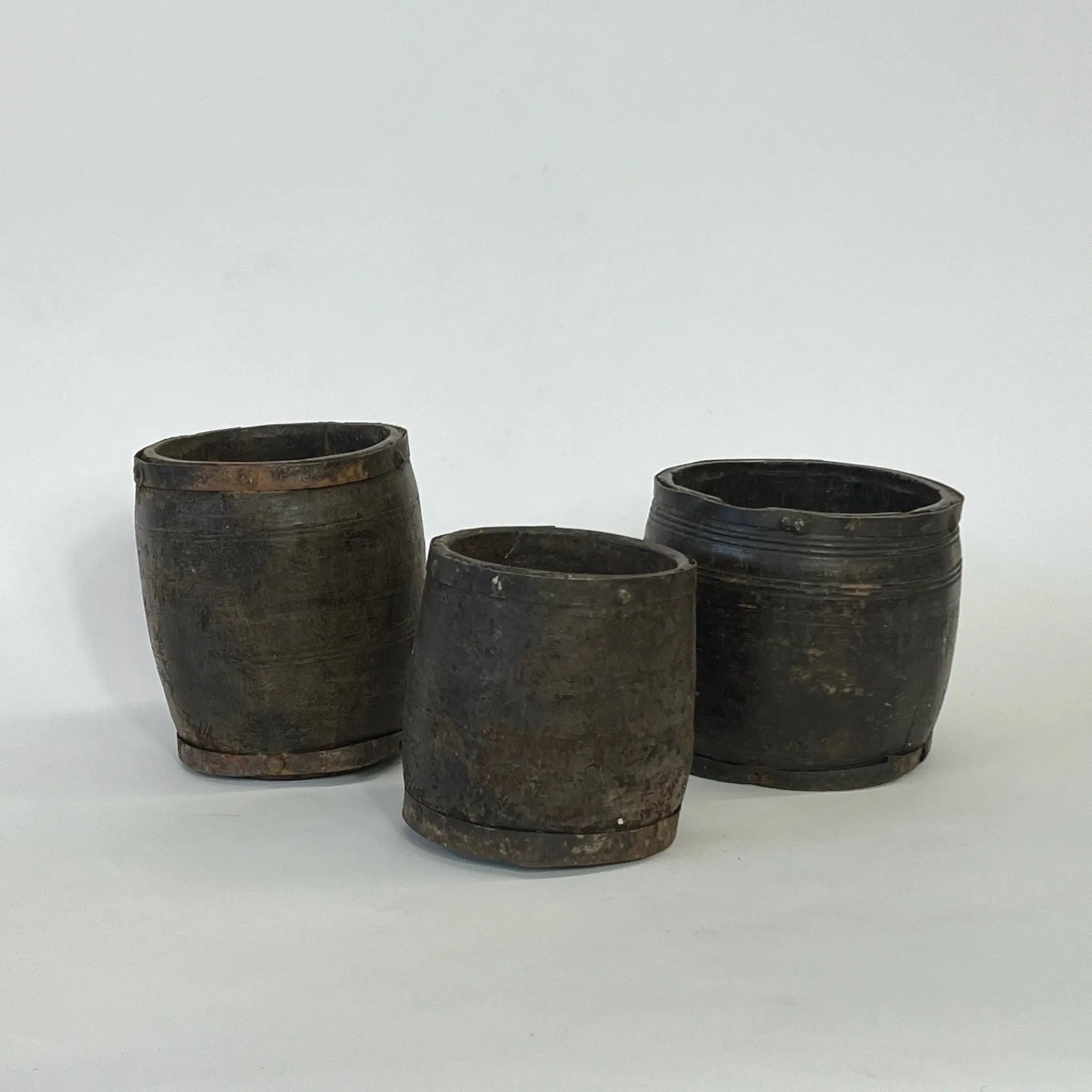 WOODEN BARREL WITH RUSTY METAL