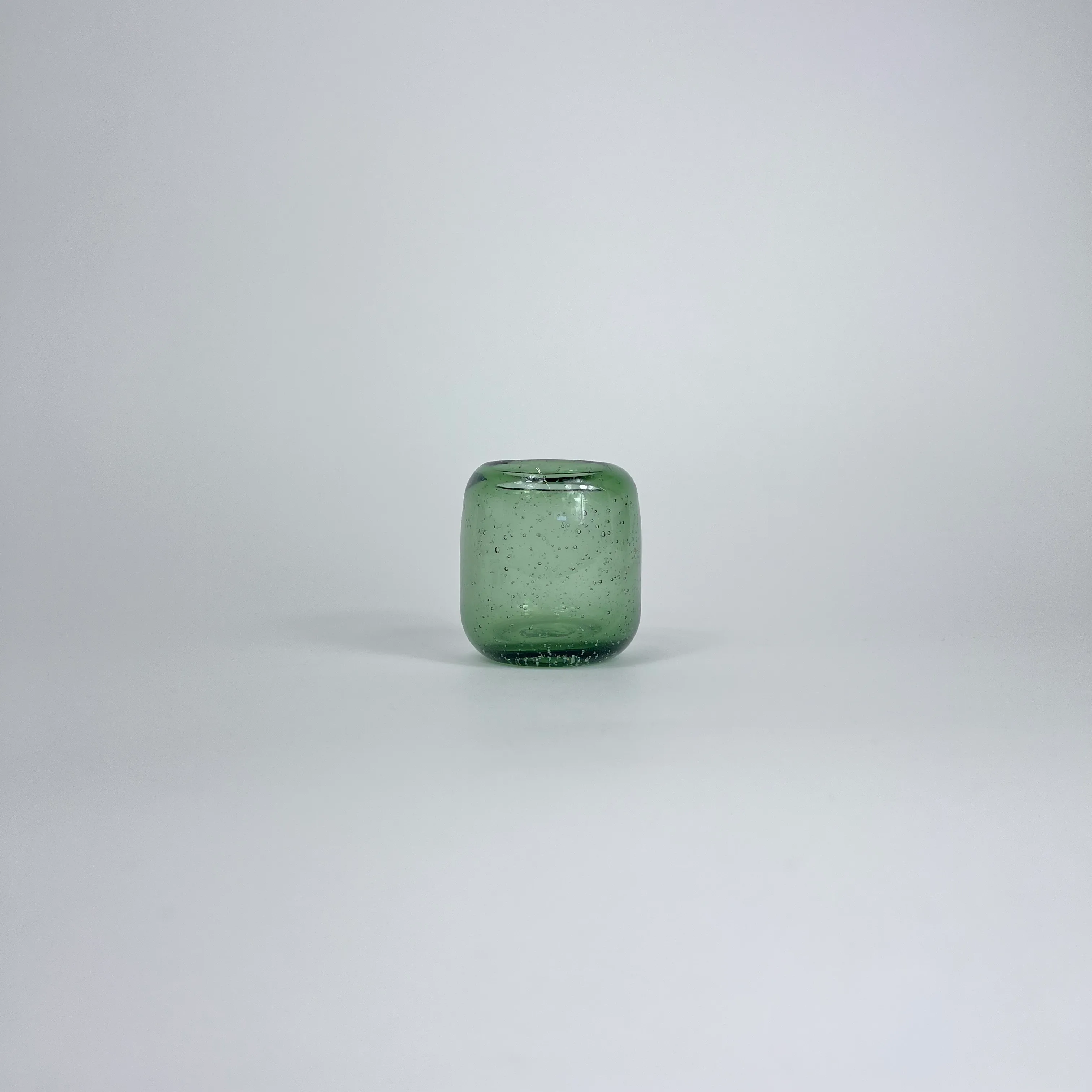 SEEDED GLASS GREEN VOTIVE