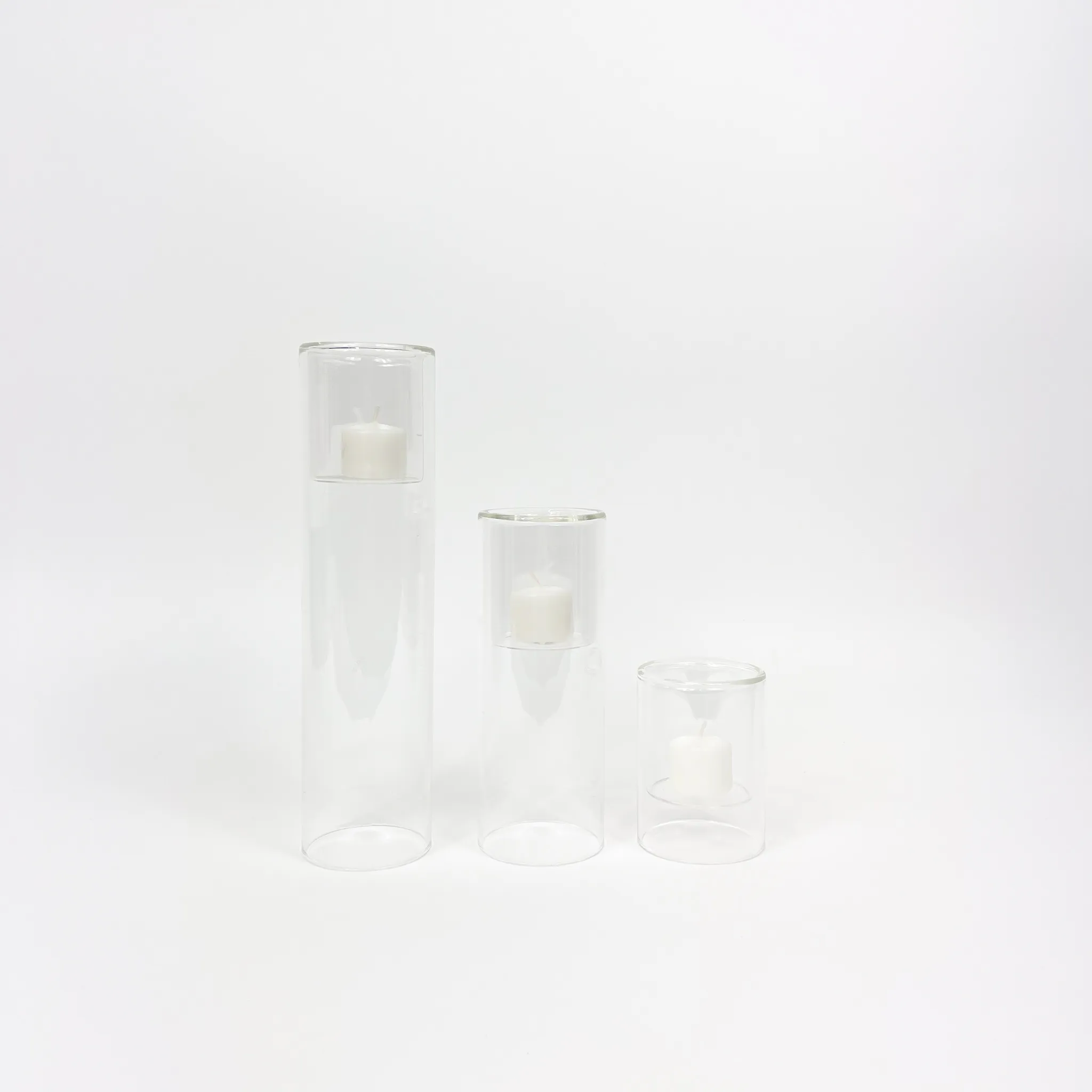 FLOATING GLASS VOTIVE HOLDER