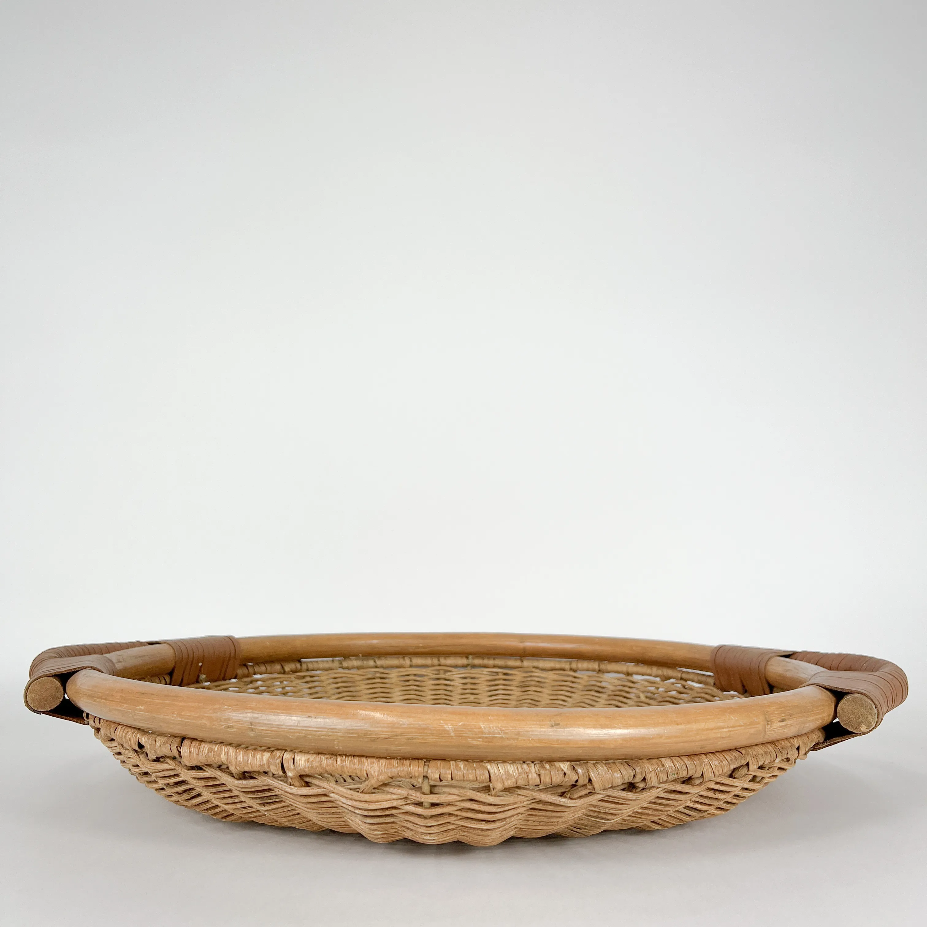 WICKER BASKET WITH LEATHER HANDLES