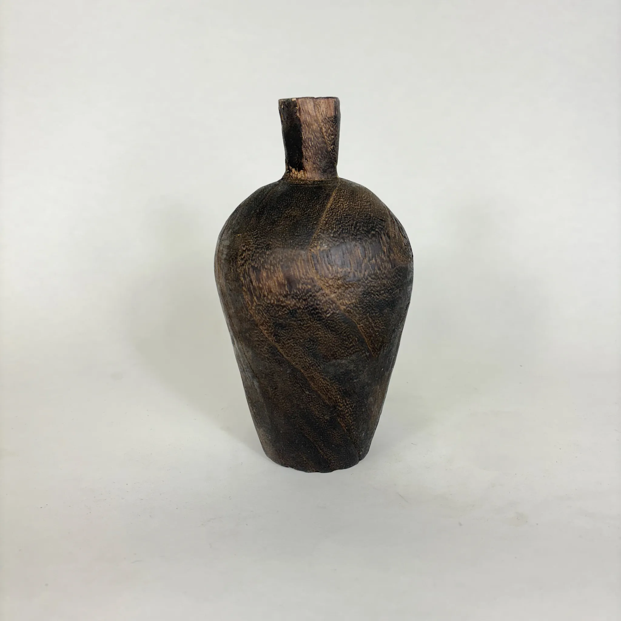 BURNED WOODEN BOTTLE