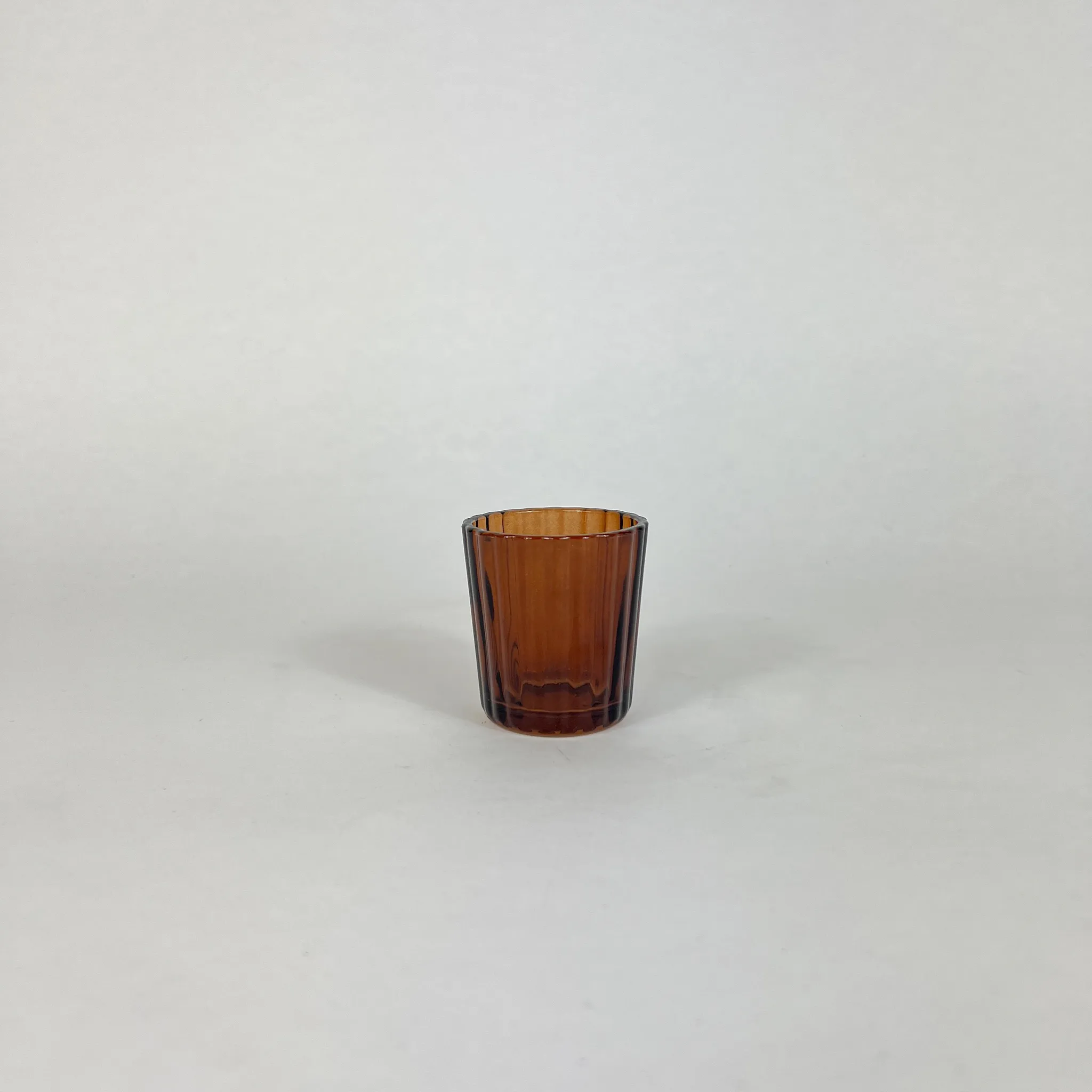 DARK AMBER FLUTED GLASS VOTIVE HOLDER