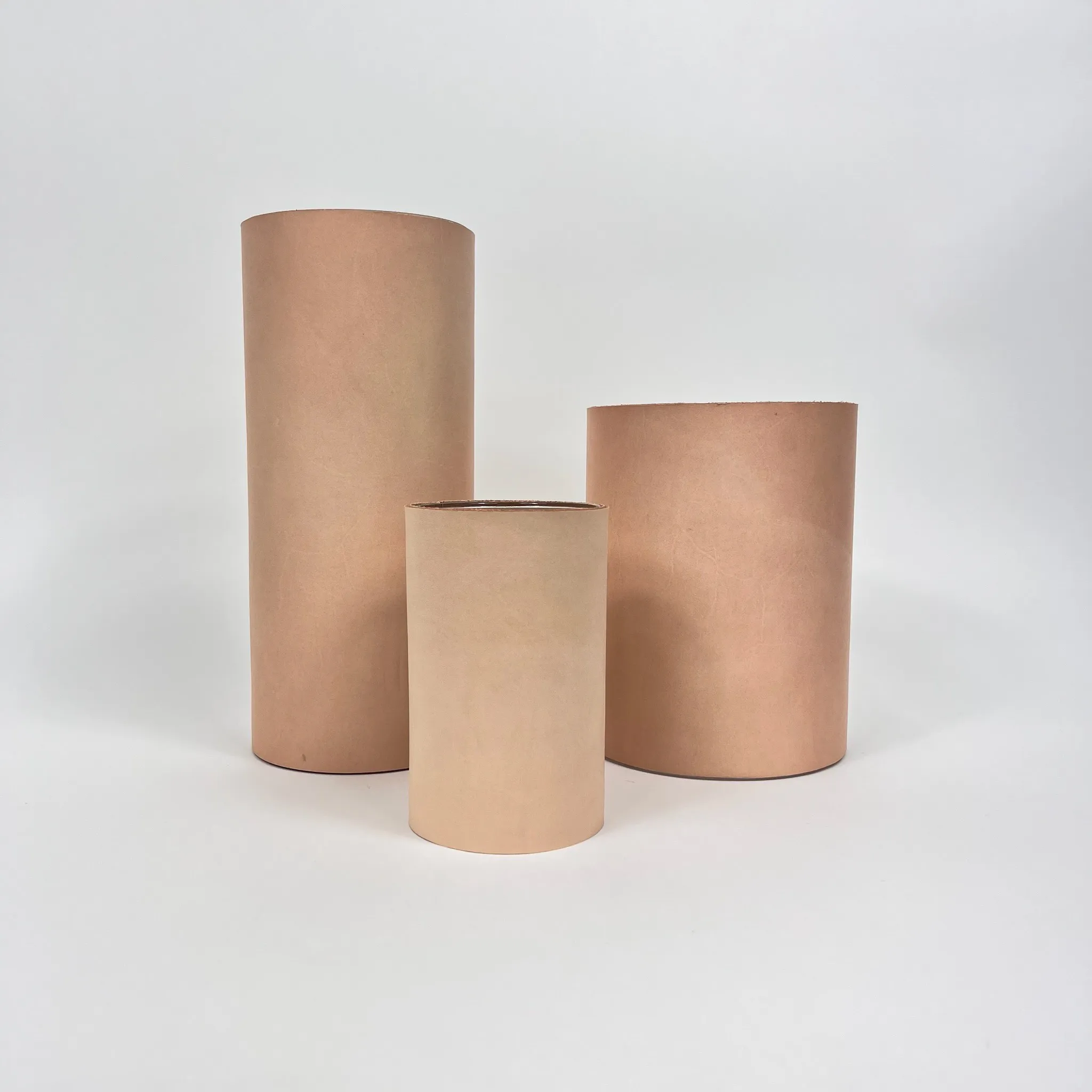 LEATHER WRAPPED SAND VASE