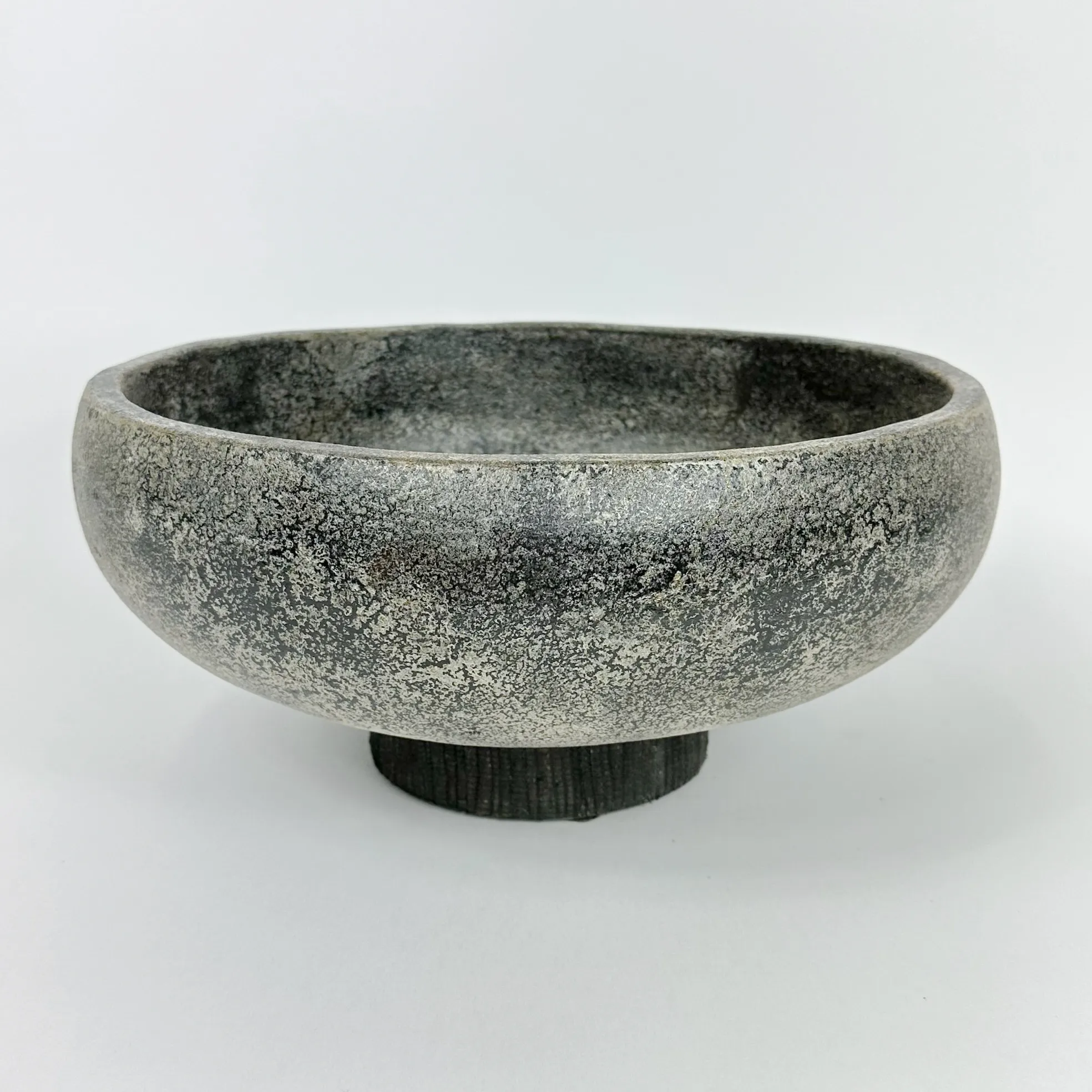 AGED STONE FOOTED BOWL