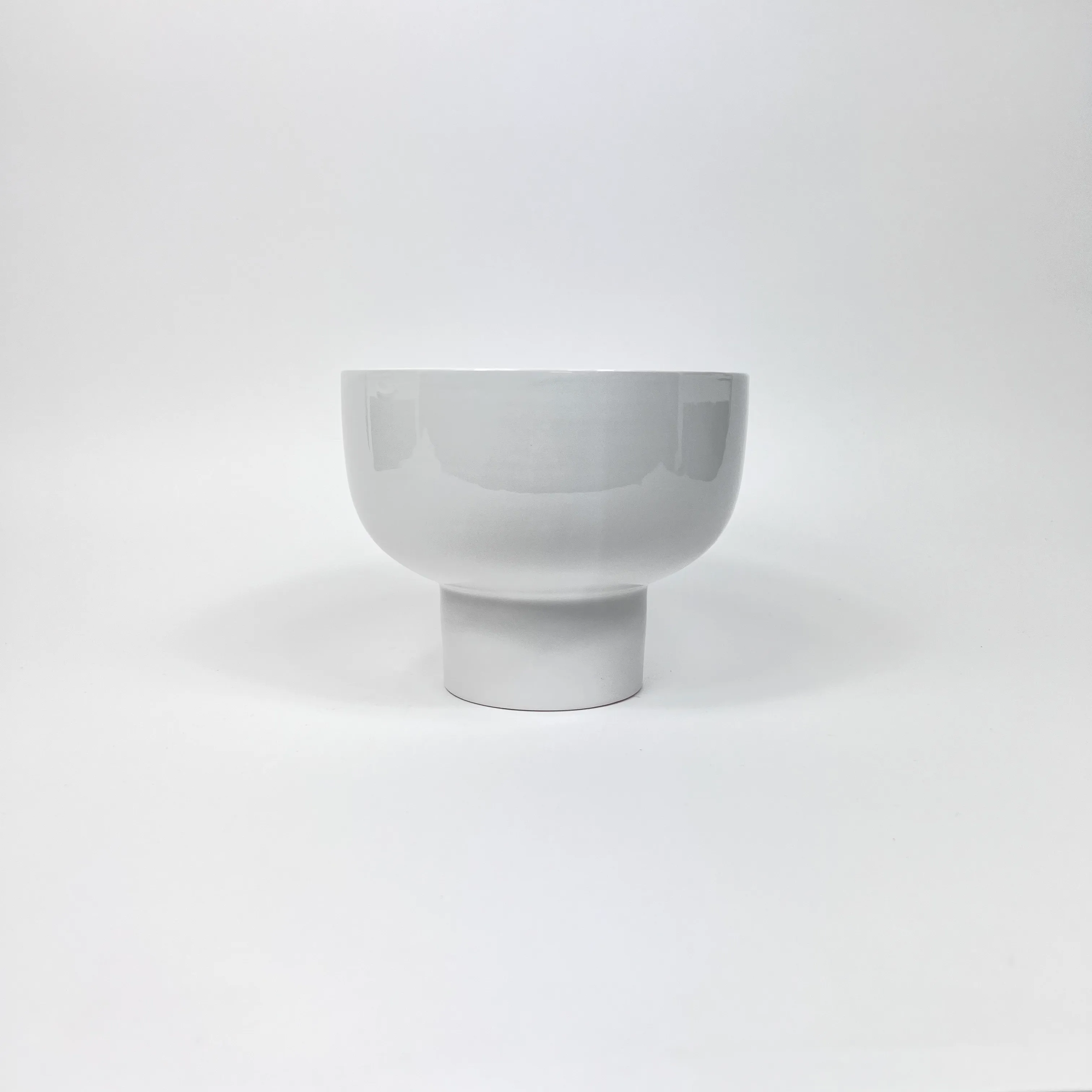 WHITE CERAMIC PEDESTAL BOWL