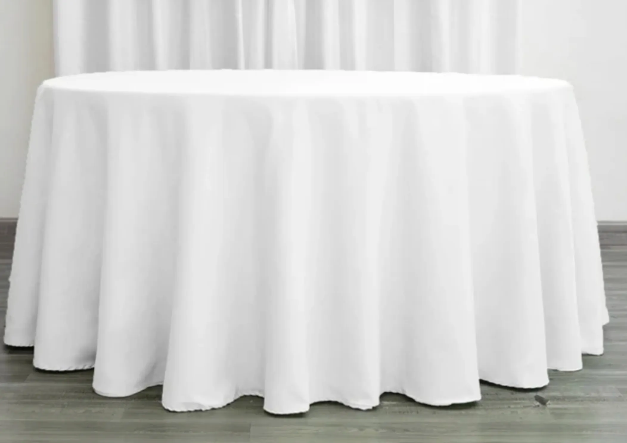 White Polyester Tablecloth (120" round)