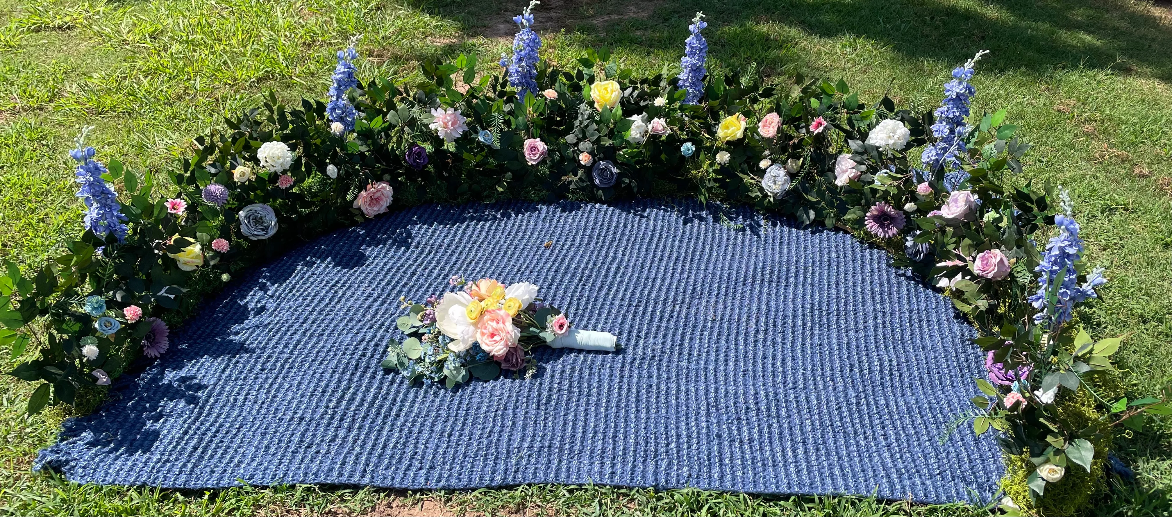 Grounded Floral Arbor