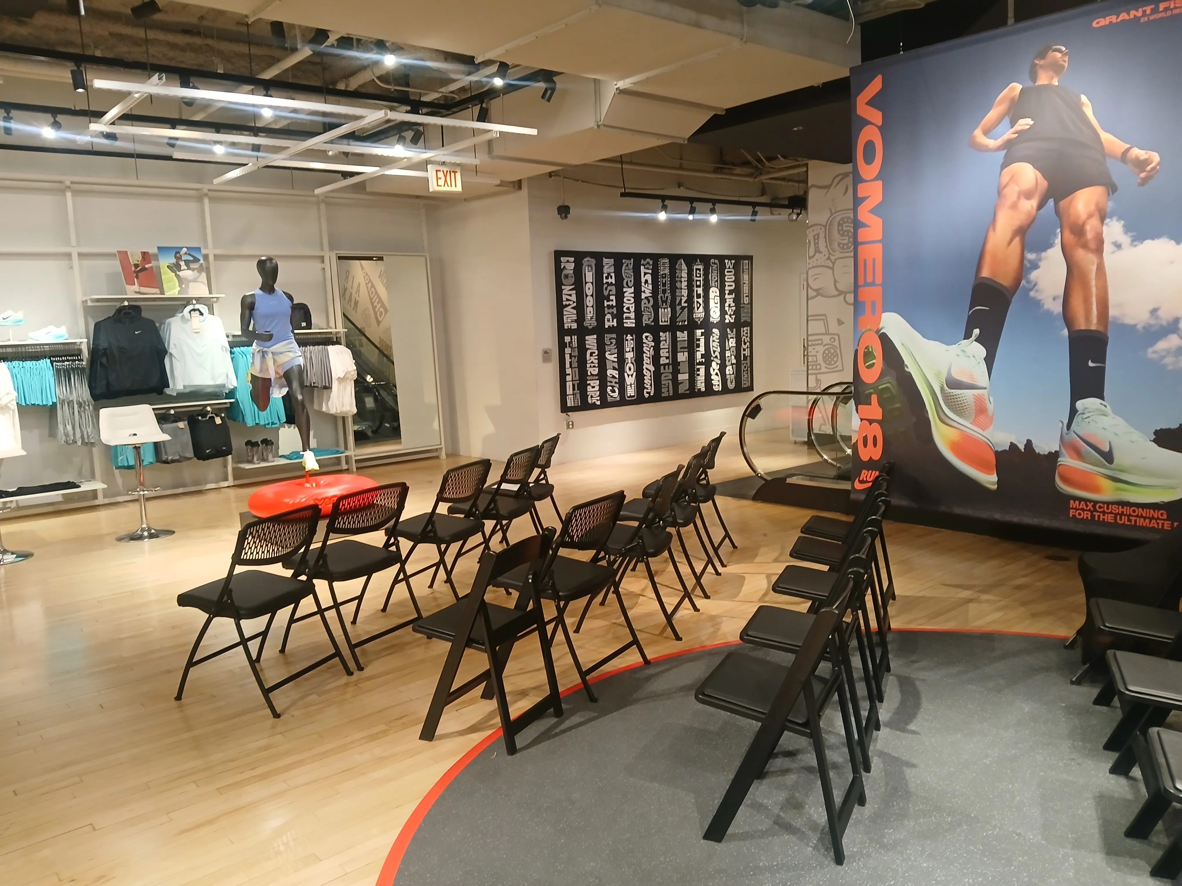 Black padded chairs with metal frame