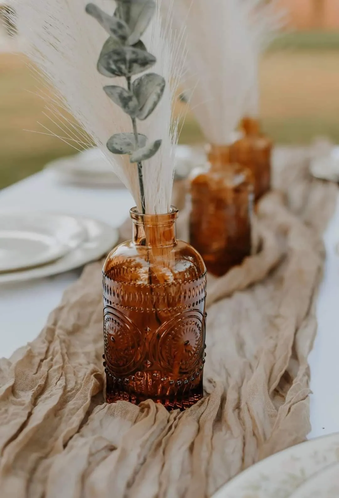 TABLESCAPES: AMBER BOTTLES WITH CIRCLE DESIGN bud vase {boho collection only}