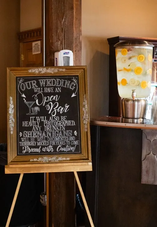SIGN: Ornate gold frame "Our Wedding will have an open bar"