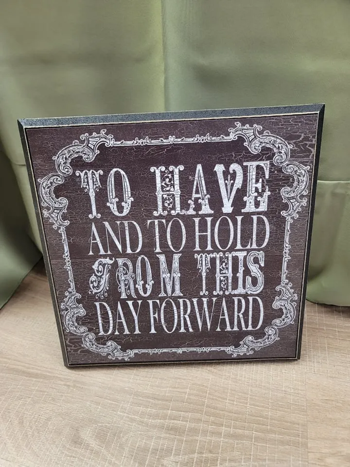 SIGN: black & white "to have to hold from this day forward"