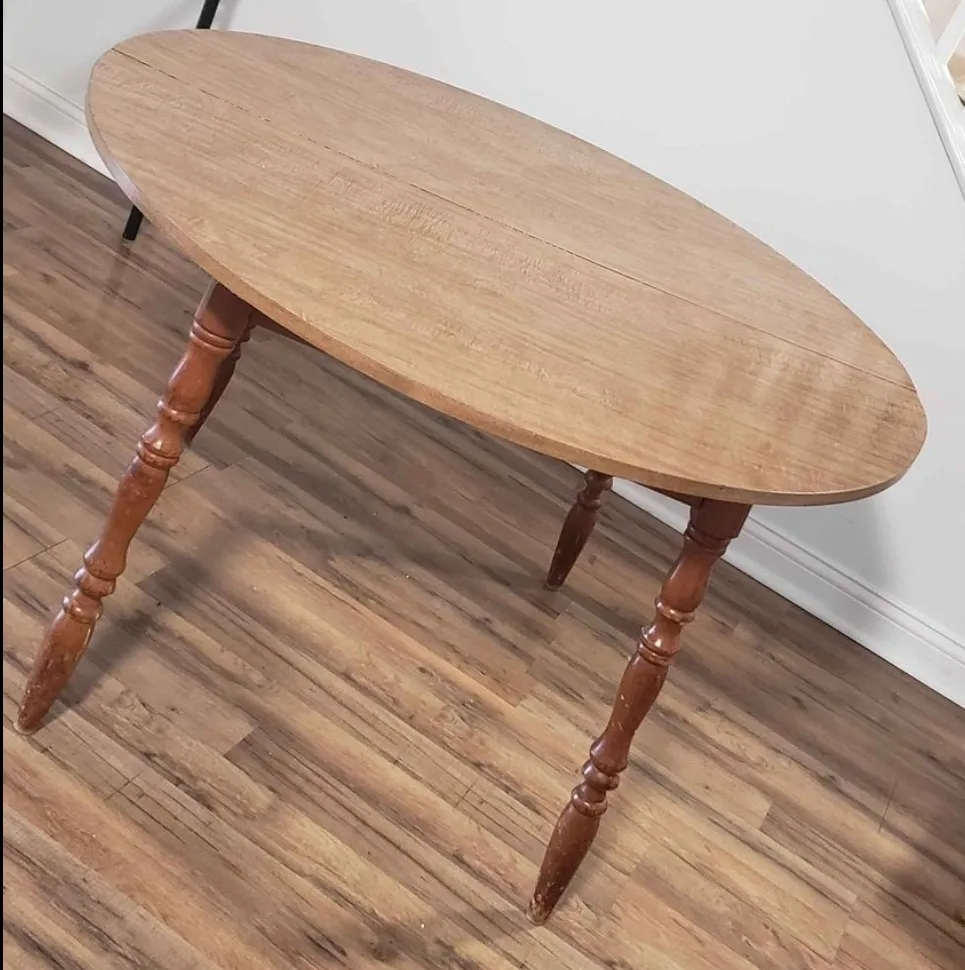 TABLE: 4 foot round wood table. 