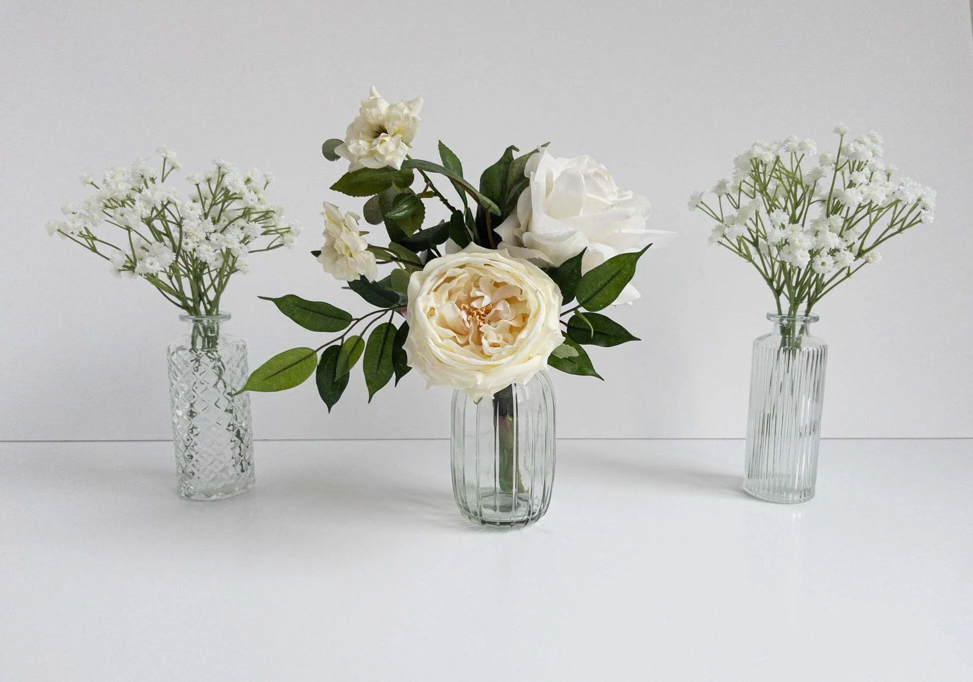 Bloemen tafelvaasjes