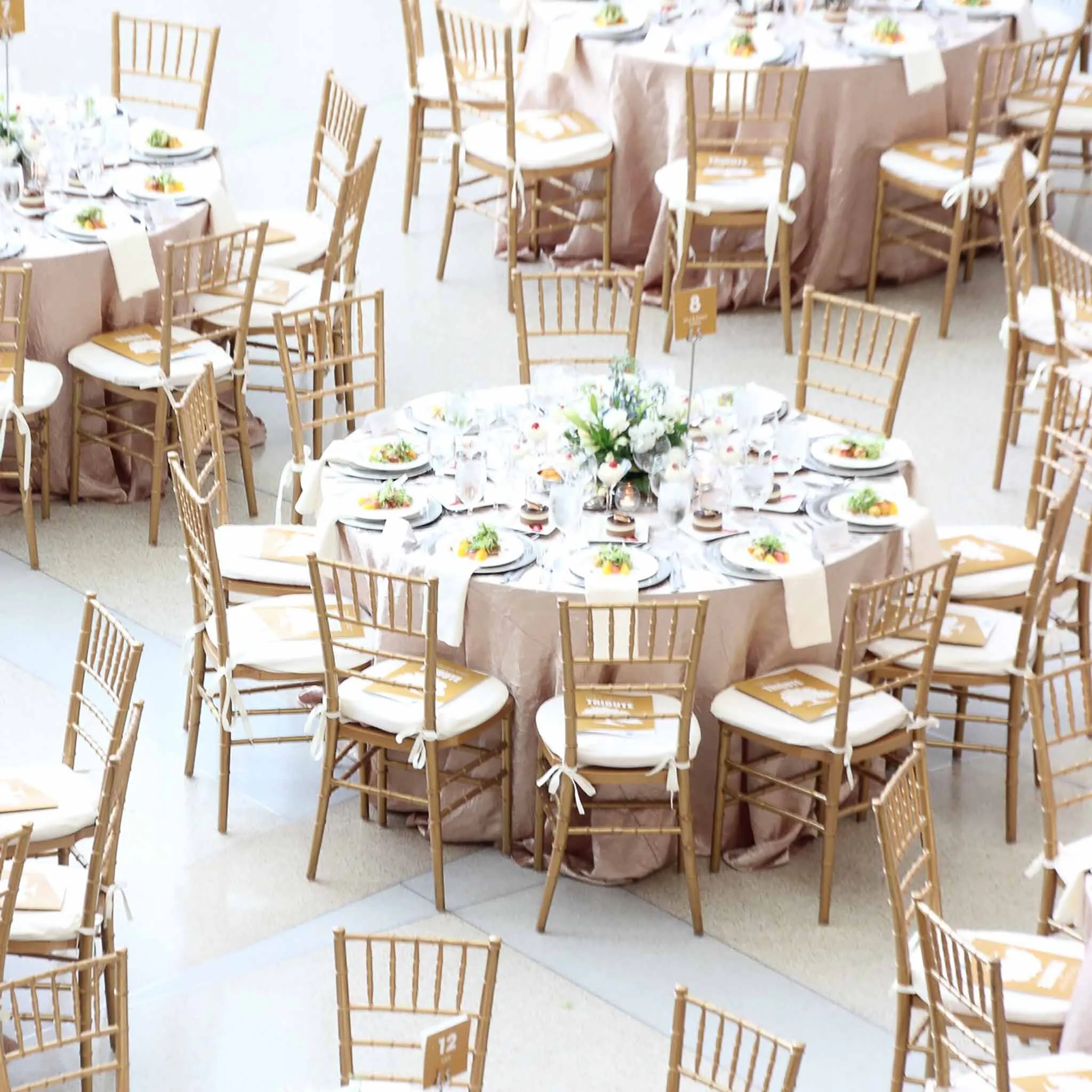 100 Gold Chiavari Chairs + 10 Round Tables 72"
