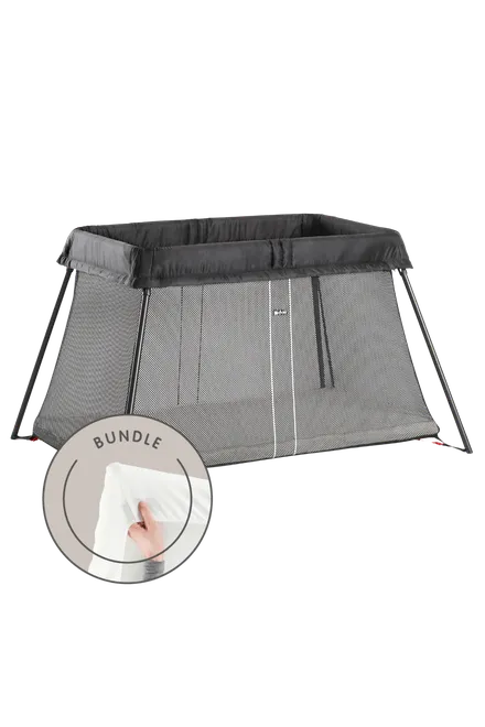 Baby Bjorn Travel Crib (includes mattress and sheets)