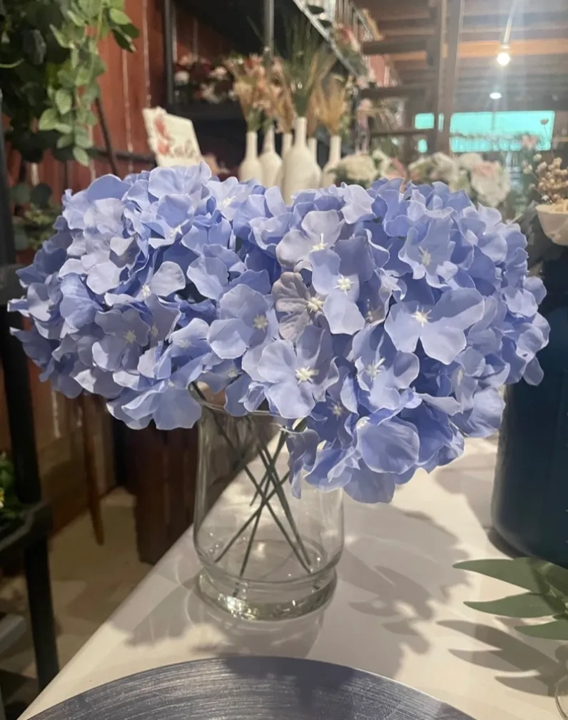 Dusty Blue/Lilac Hydrangea in Glass Vases
