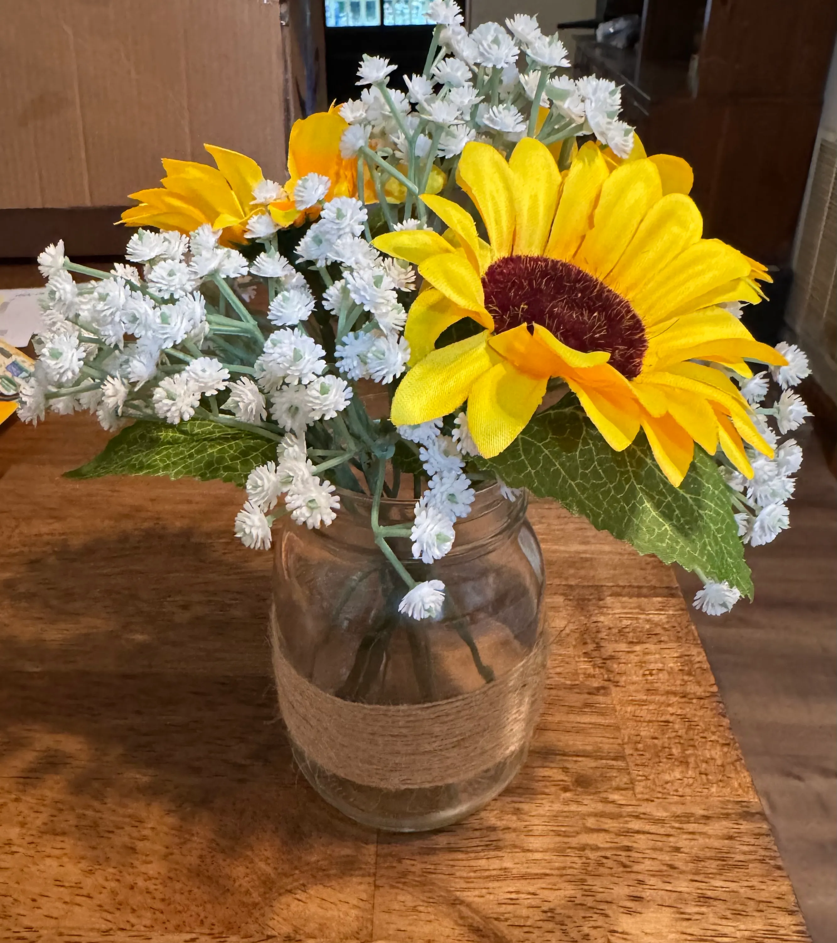 Sunflowers & Baby's Breath in Mason Jars wrapped in twine