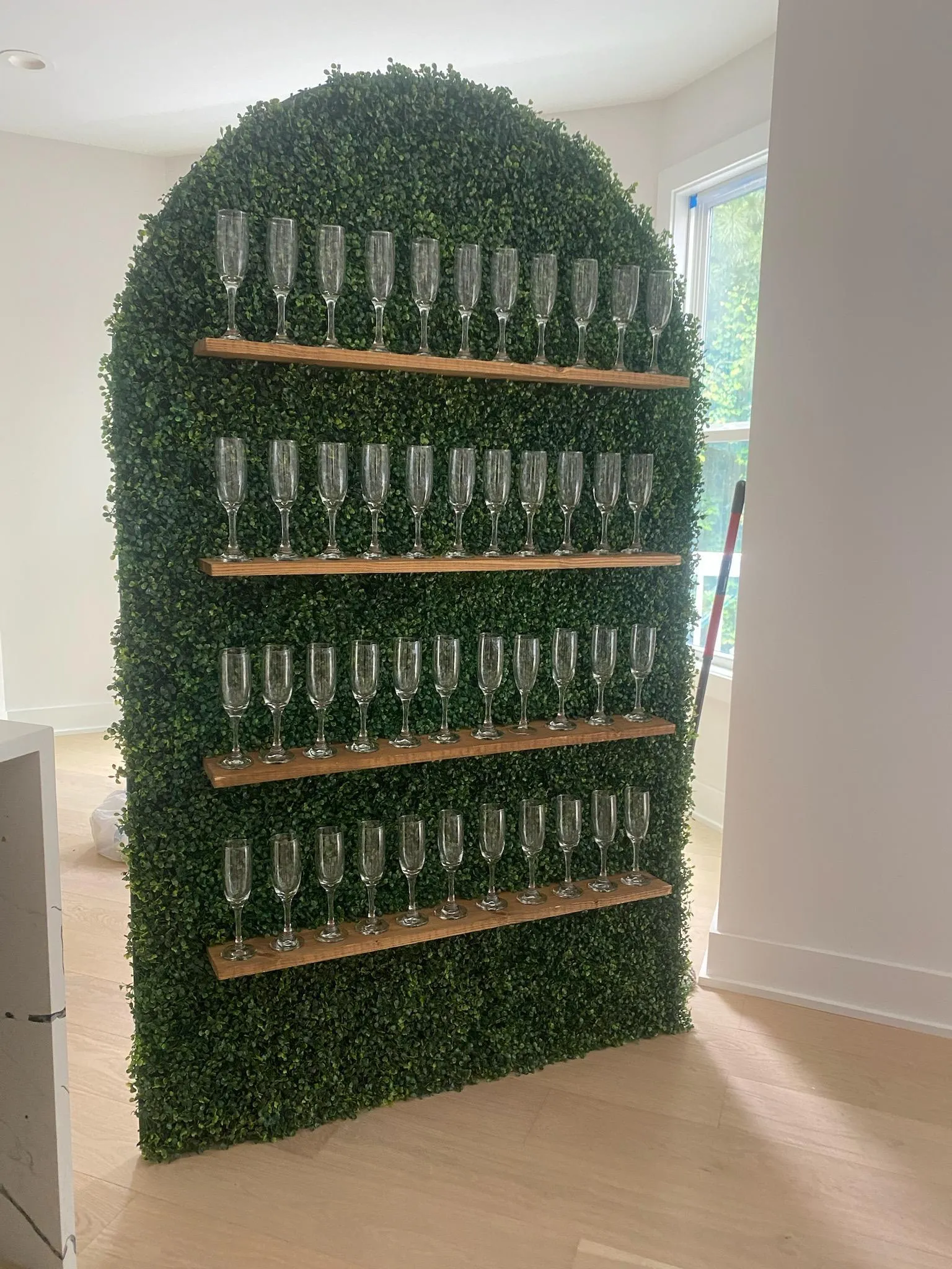 Greenery Shelf wall with 44 Champagne Flutes