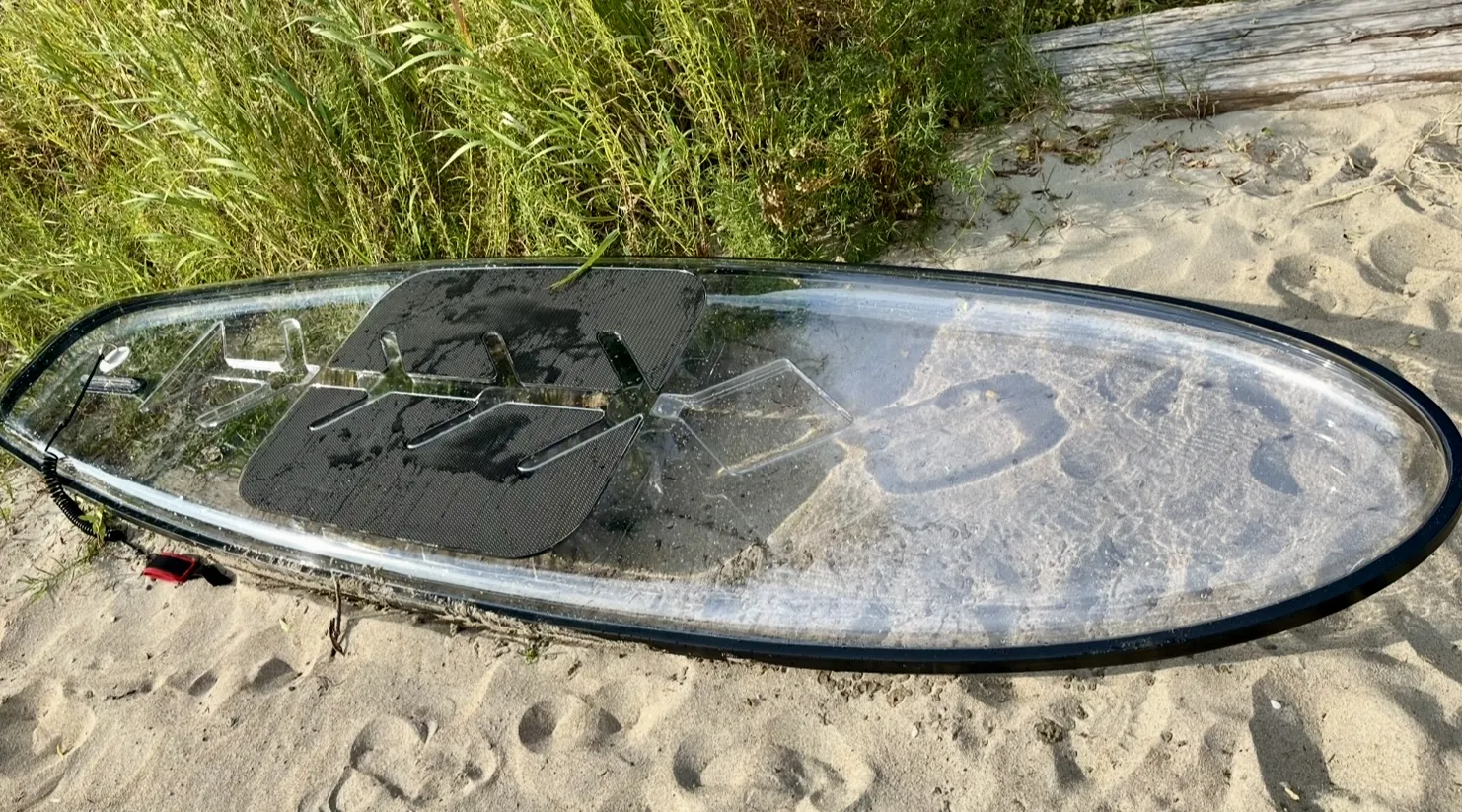 Clear Paddleboard and Lifejacket