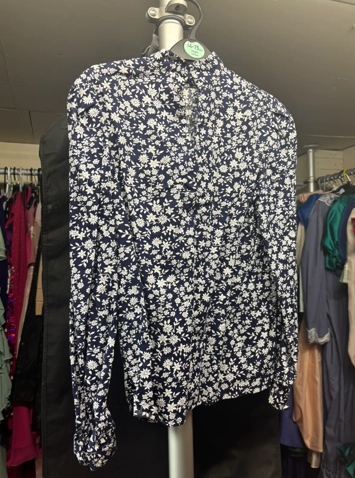 Top- navy floral shirt