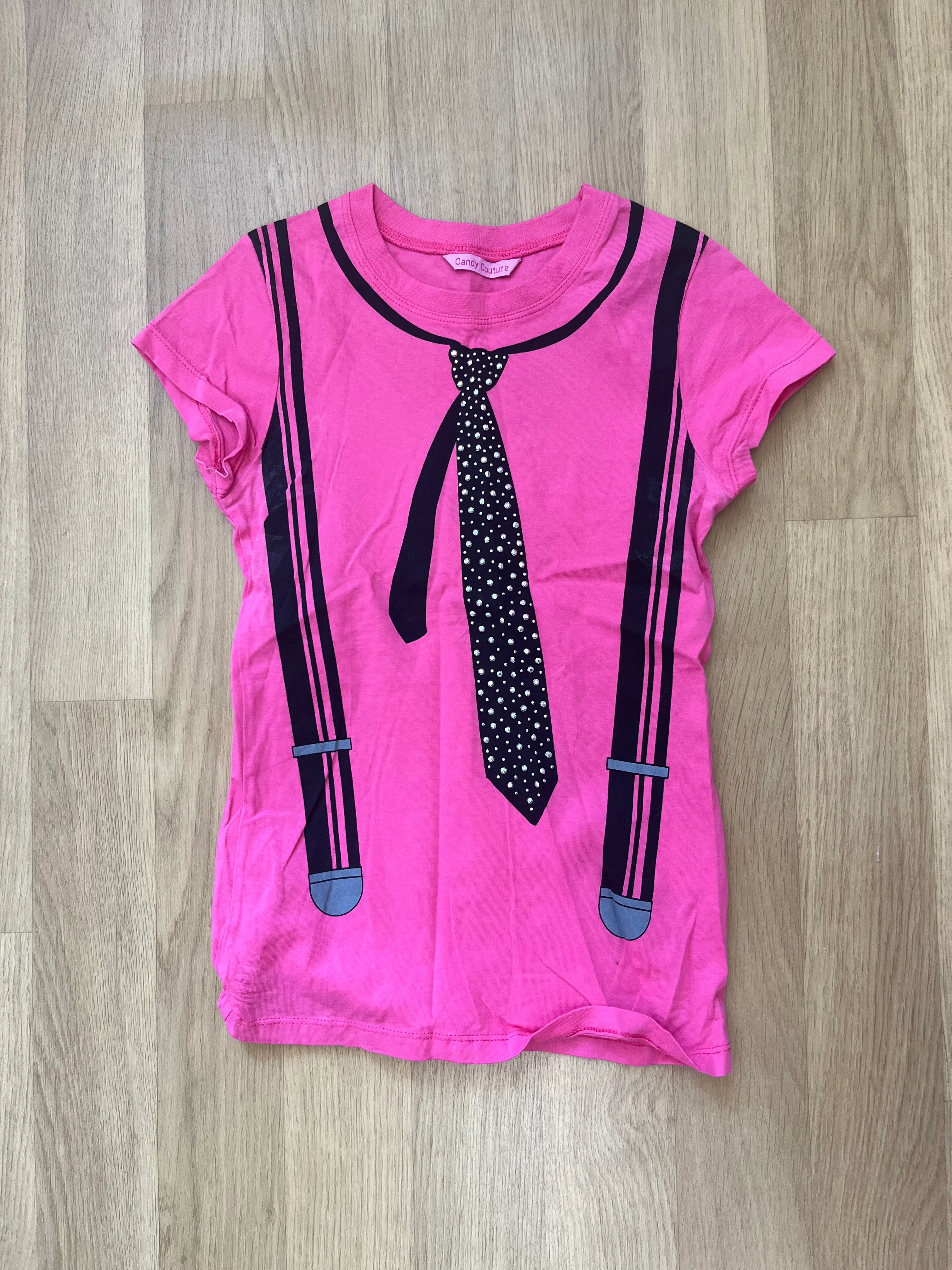 Top- Pink tie and braces design 