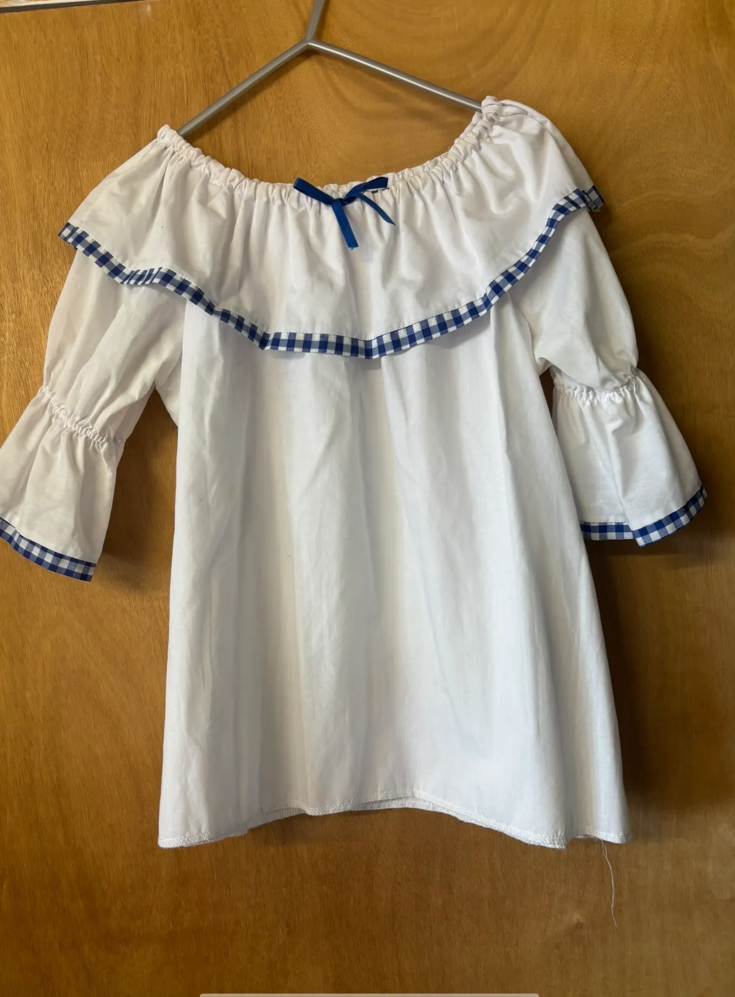 Top- White with blue outline 