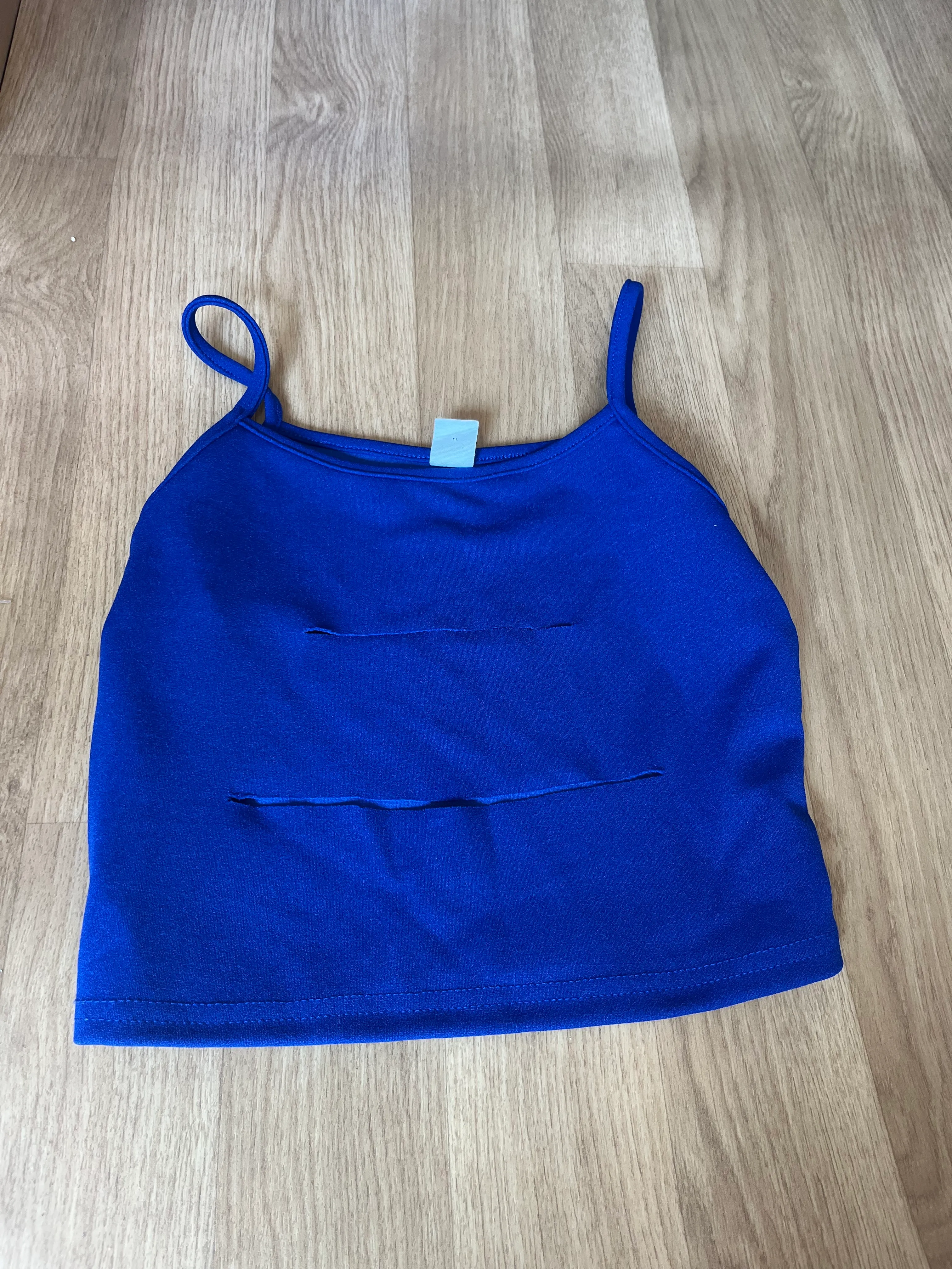 Top- Blue ripped design