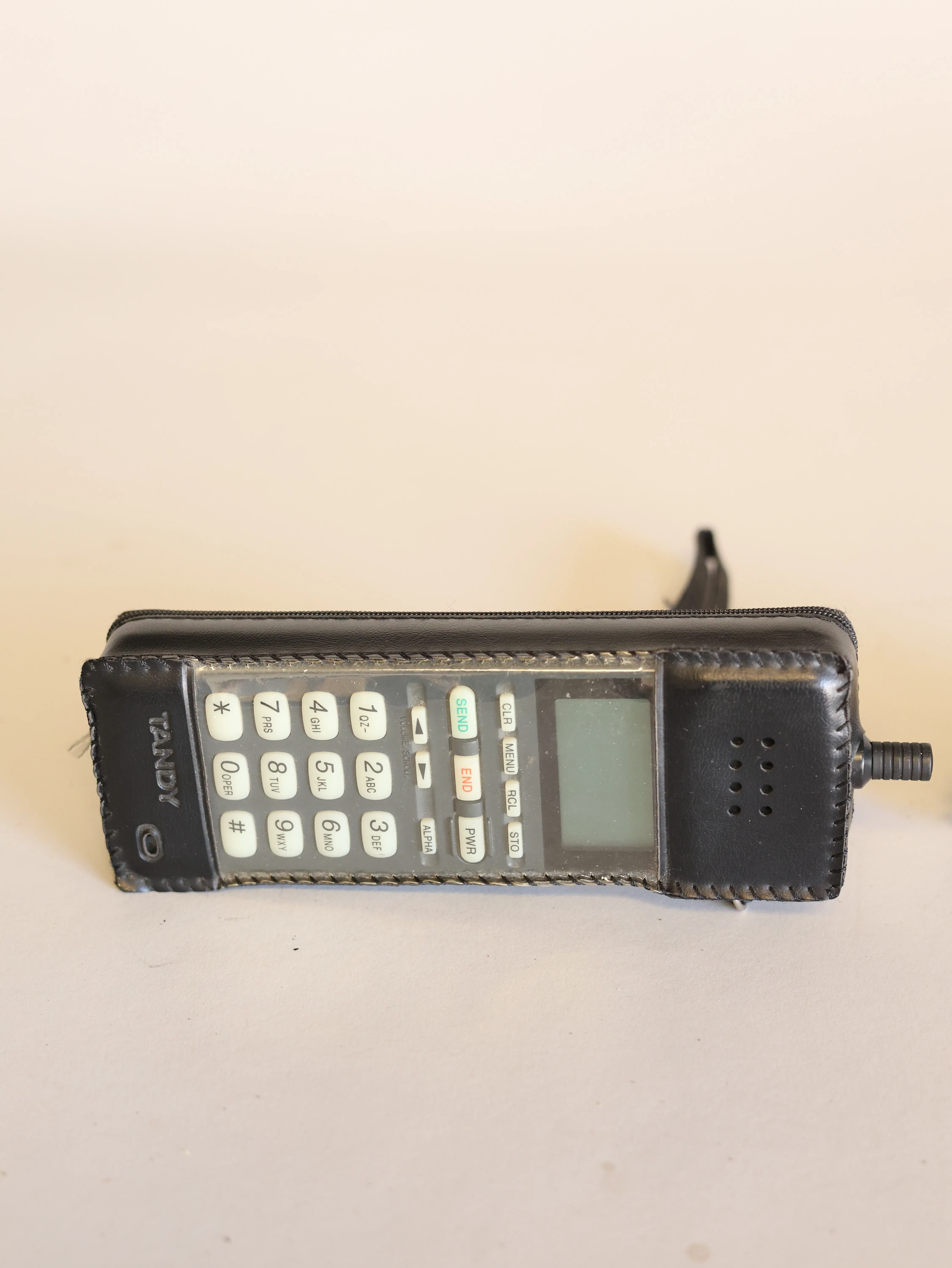 90s Tandy phone with charger