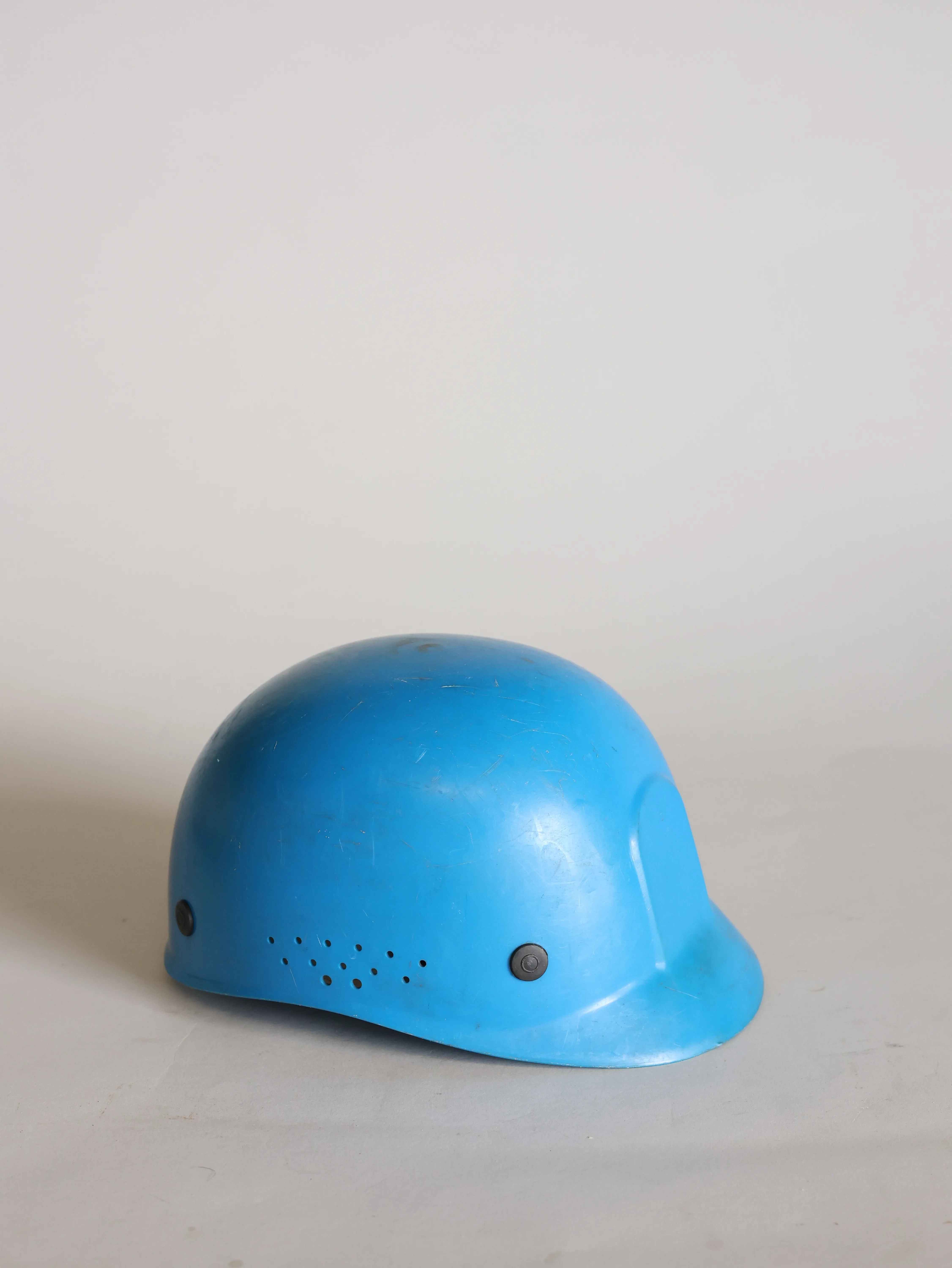 Used blue construction helmet