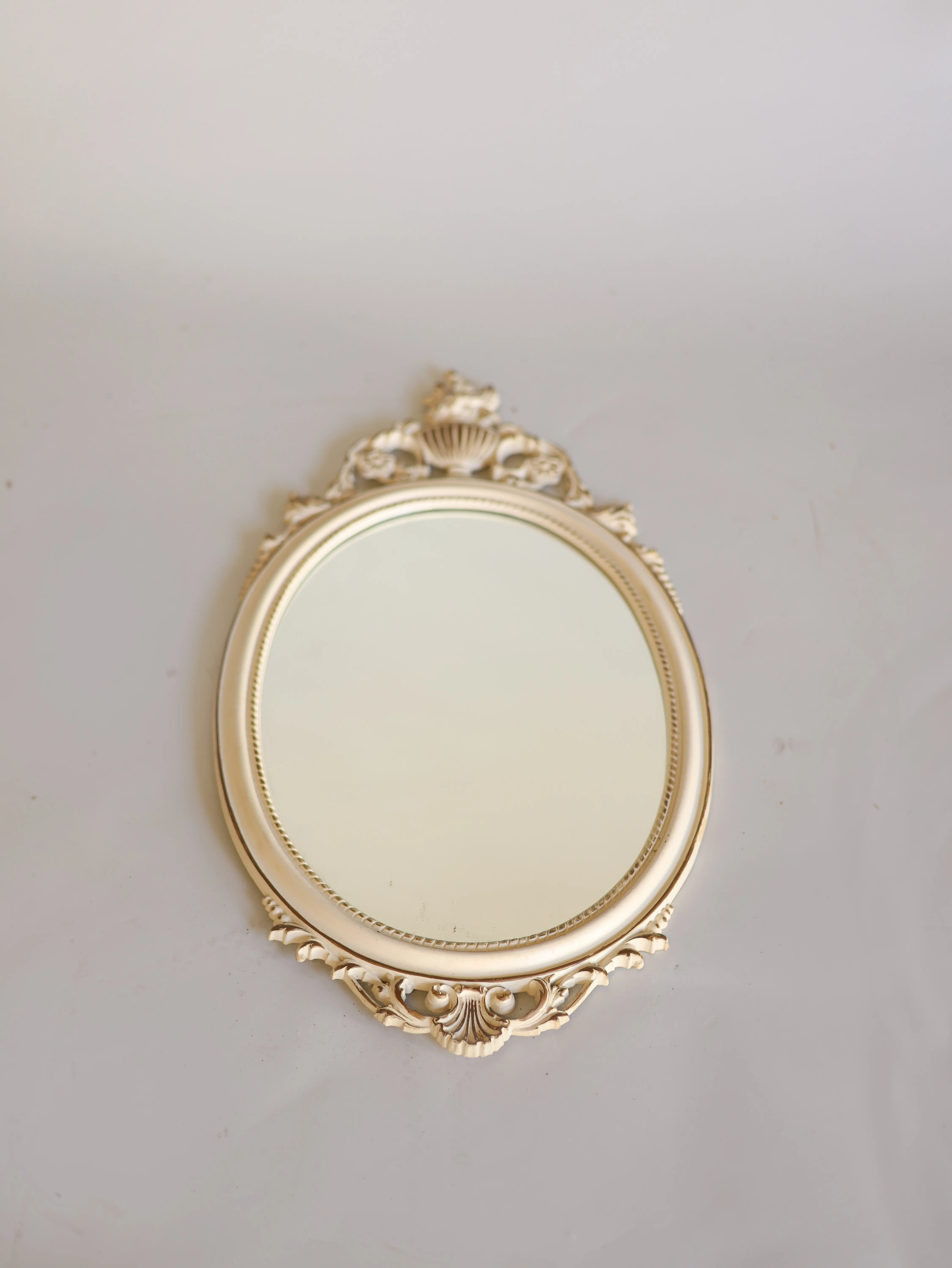 Snow white oval mirror