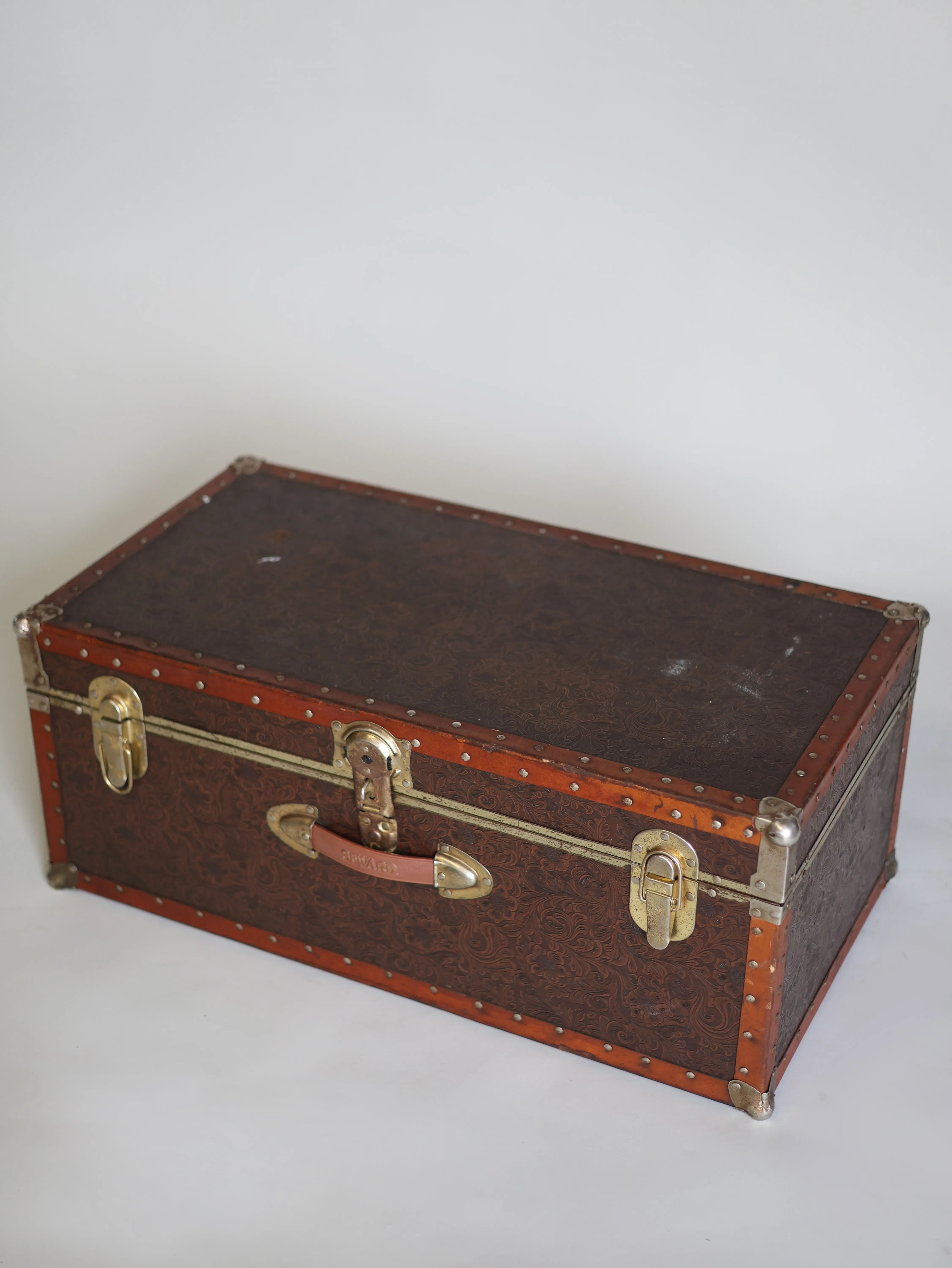 Leather and gold trunk