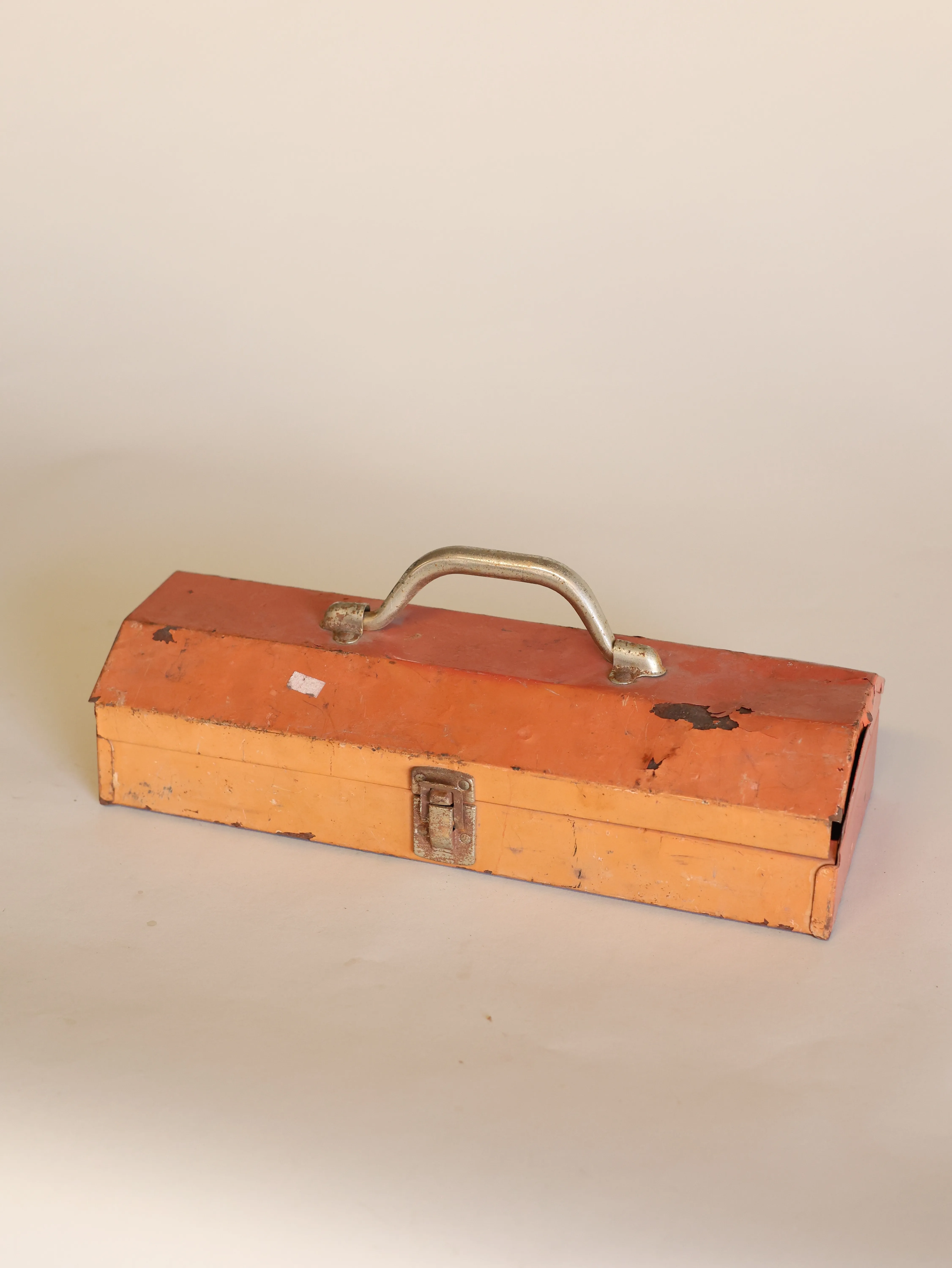 Orange metal toolbox