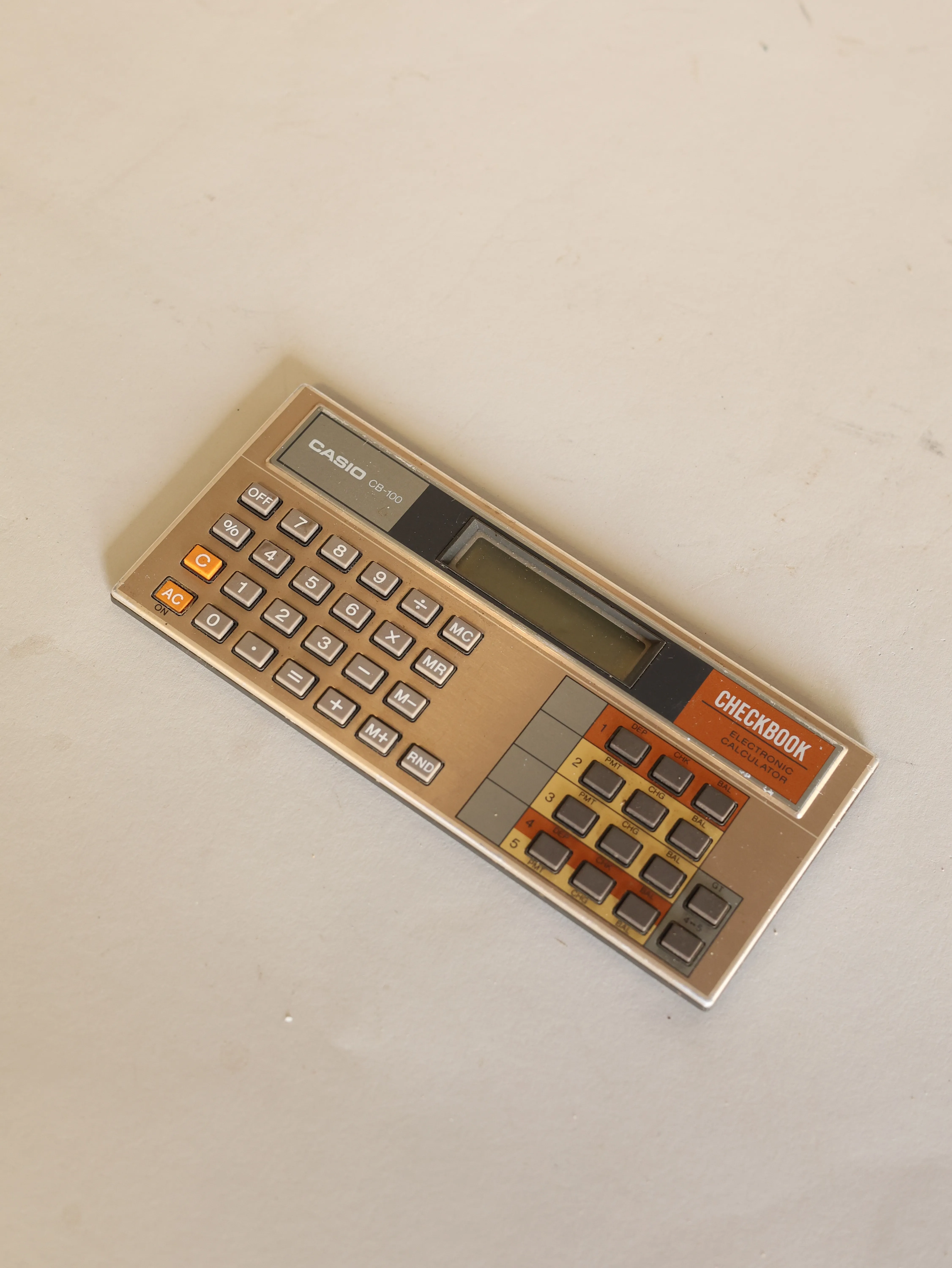 Checkbook Casio electronic calculator