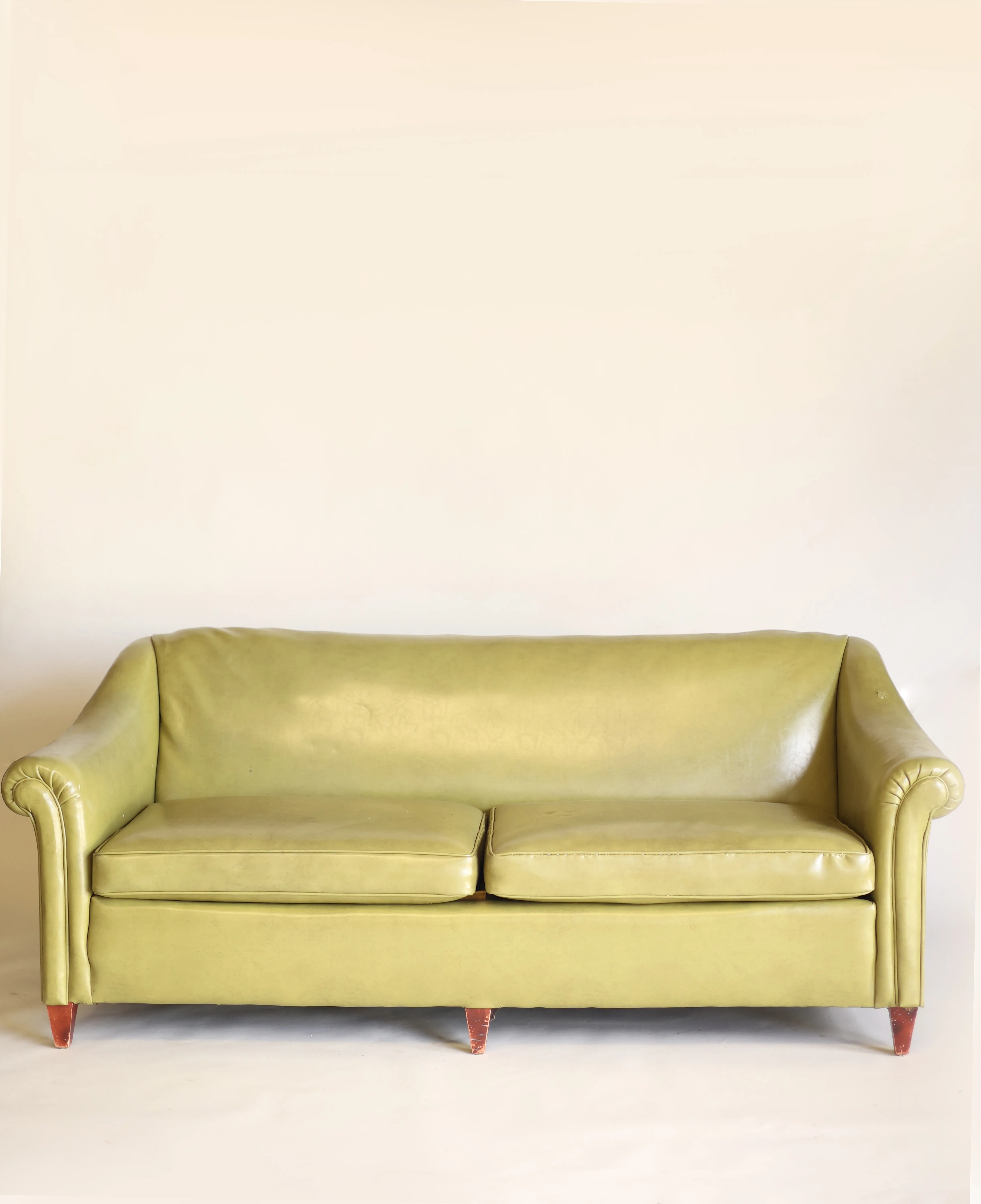 Henry Faux green leather sofa