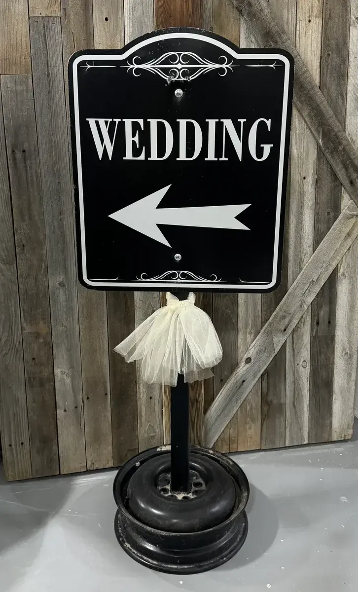Wedding to the left metal sign