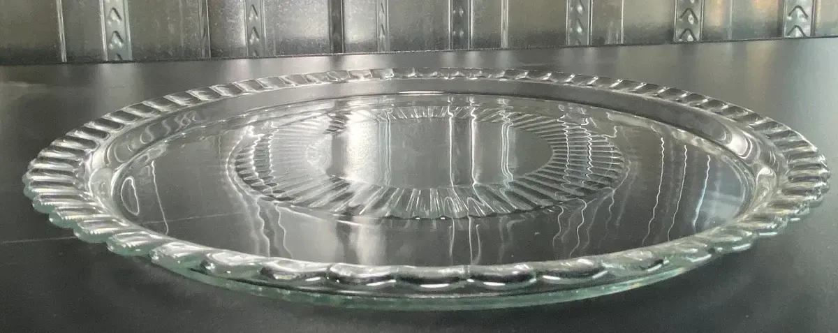 Vintage clear glass plate, pie edge