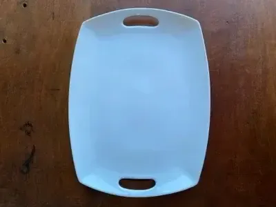 White ceramic rectangle serving tray with cut out