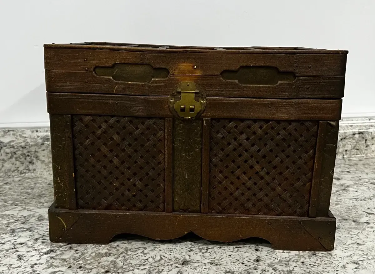 Brass and wood trunk