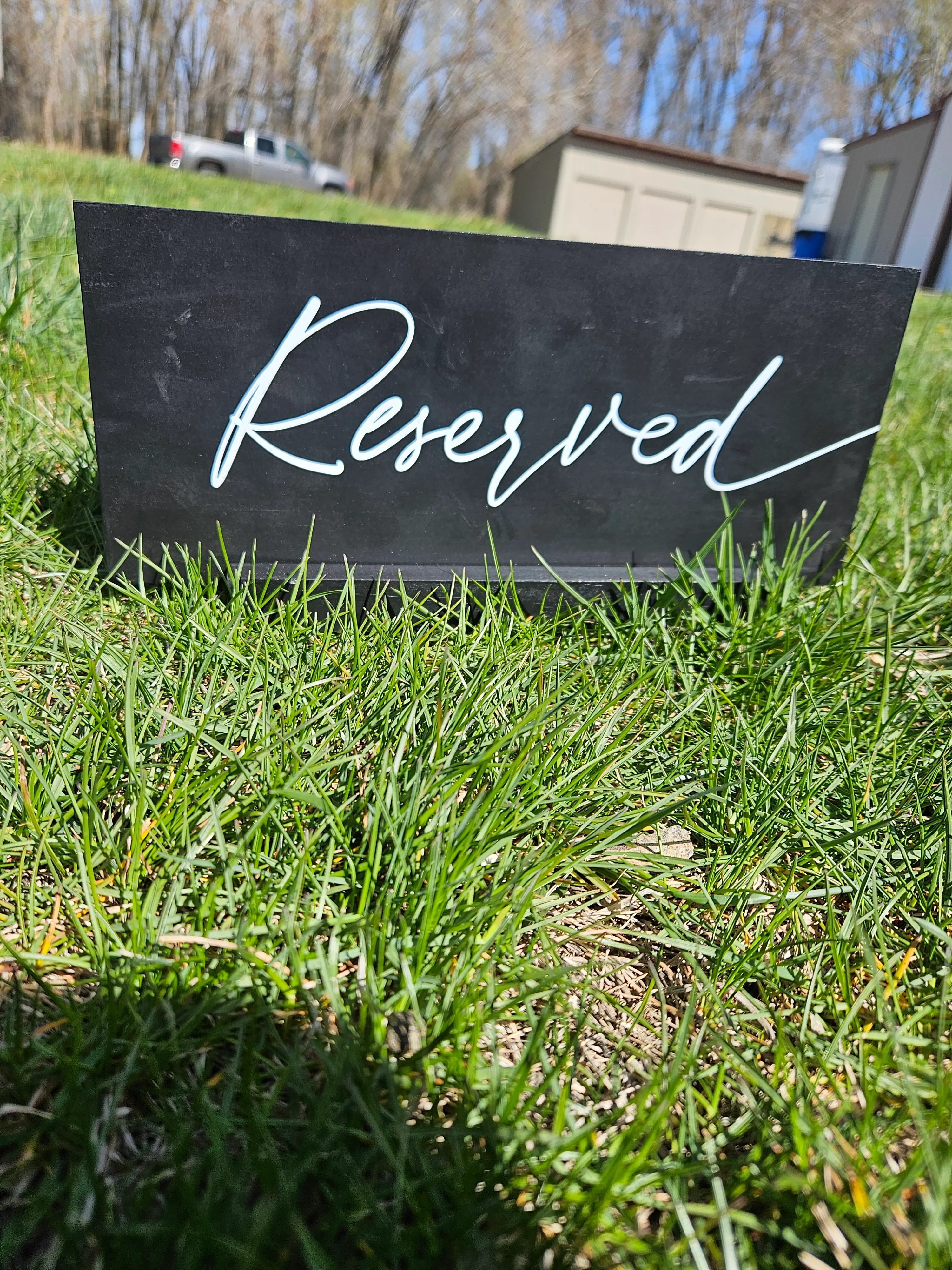 Reserved black wood table top stand