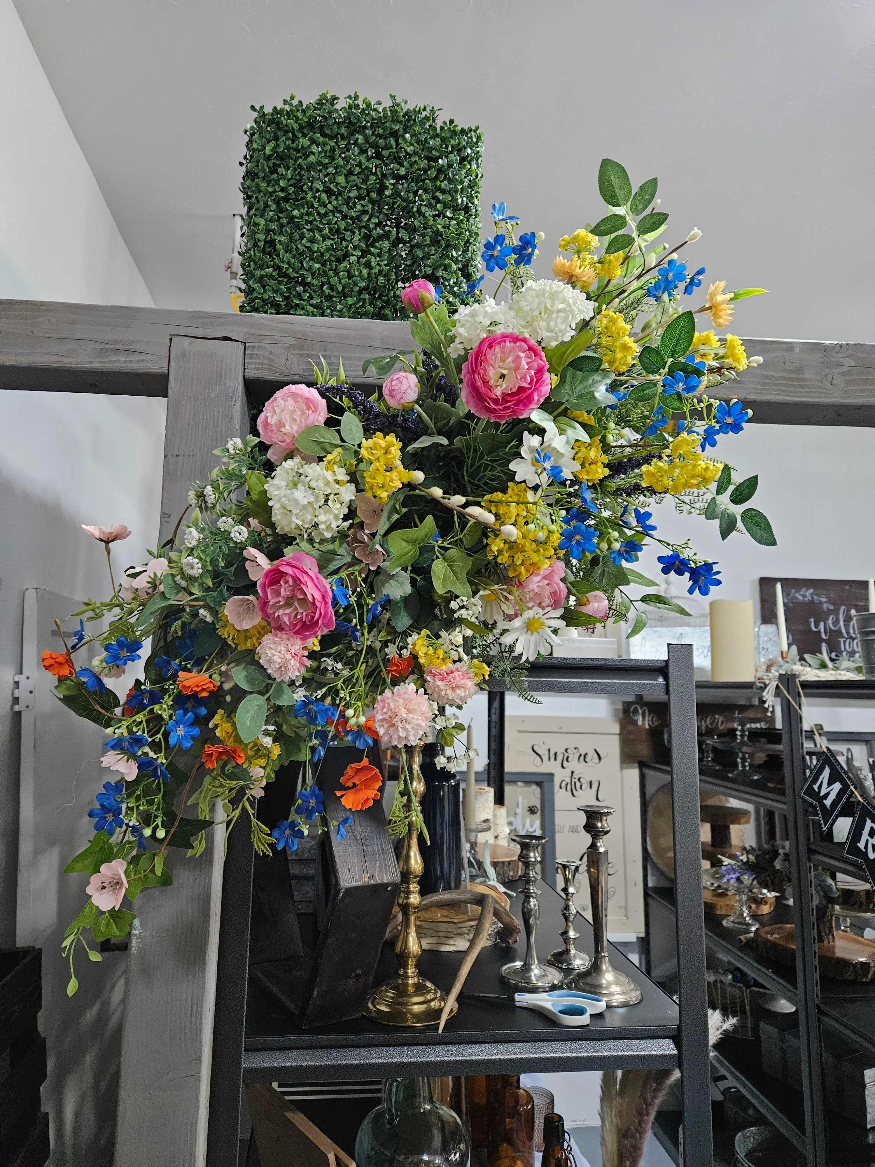 Wildflower arch arrangment sml