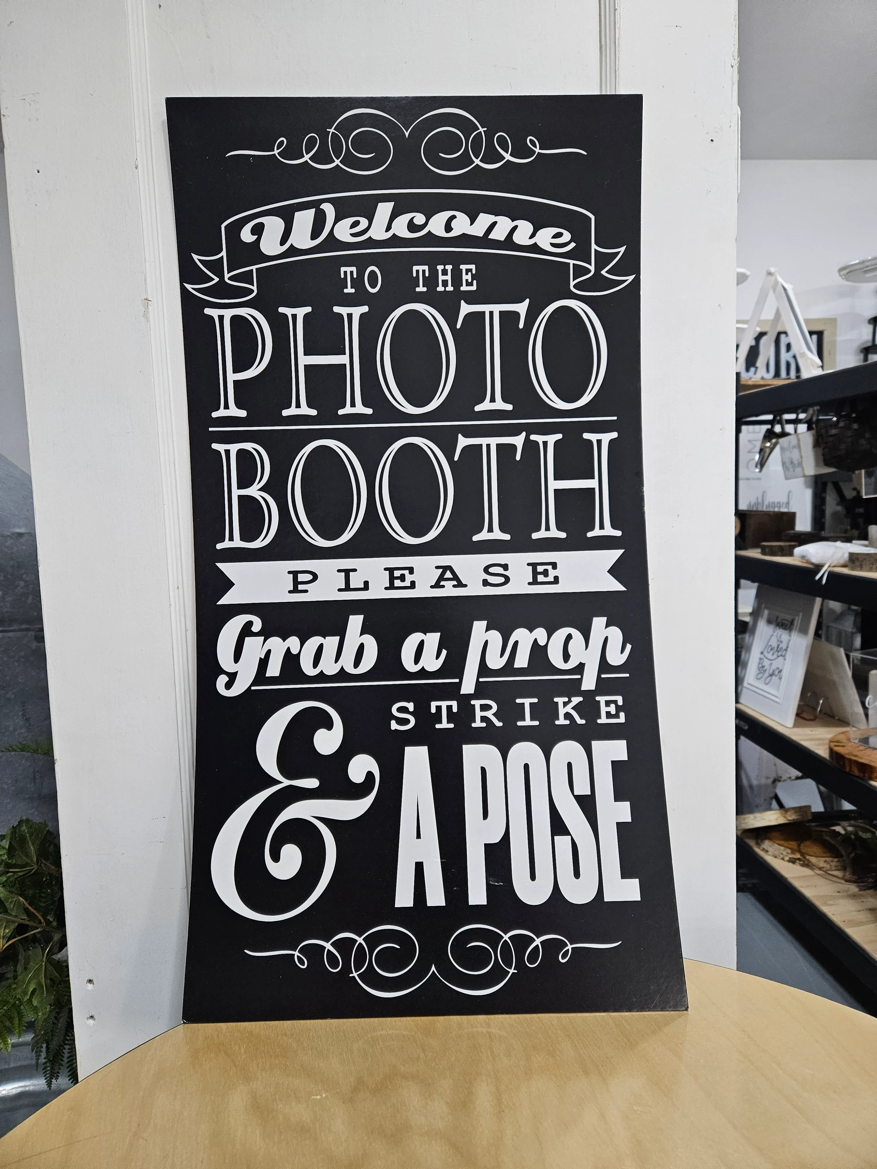 Photo booth sign strike a pose 