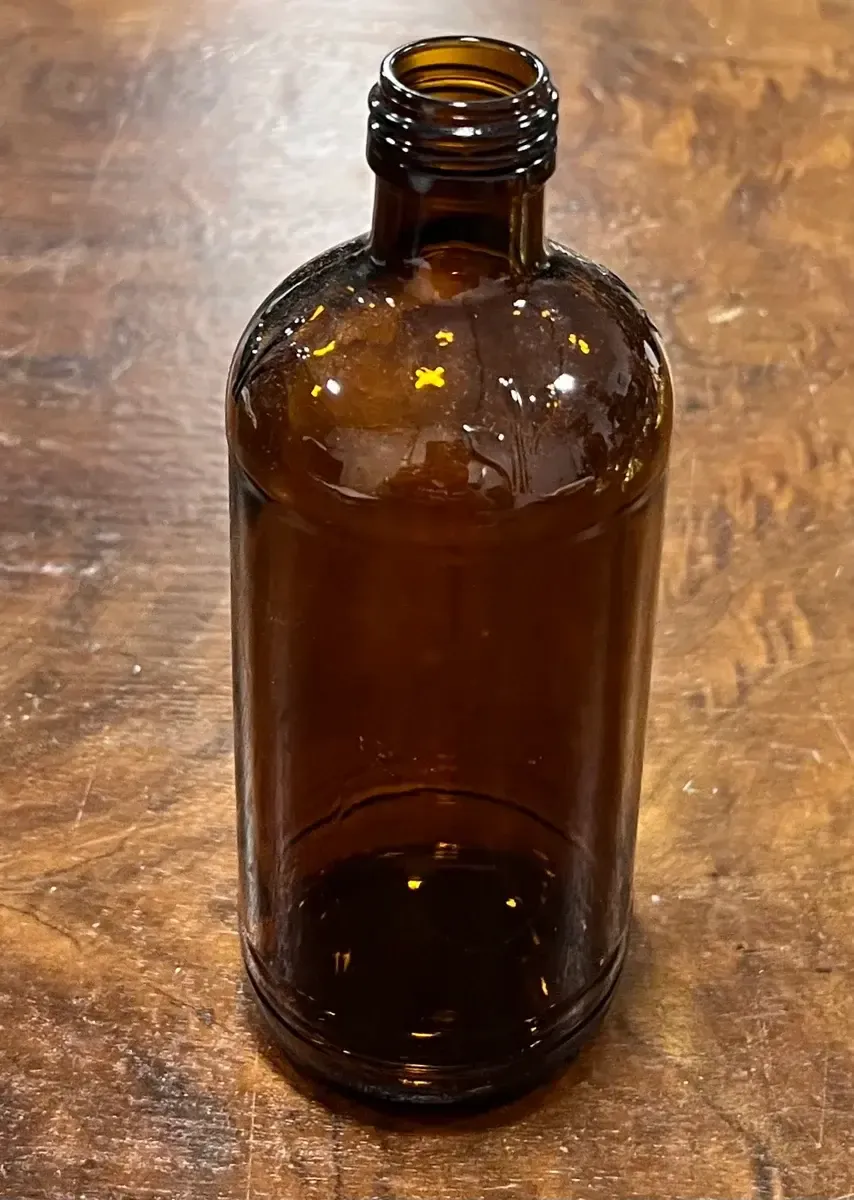Amber brown bottle 7”