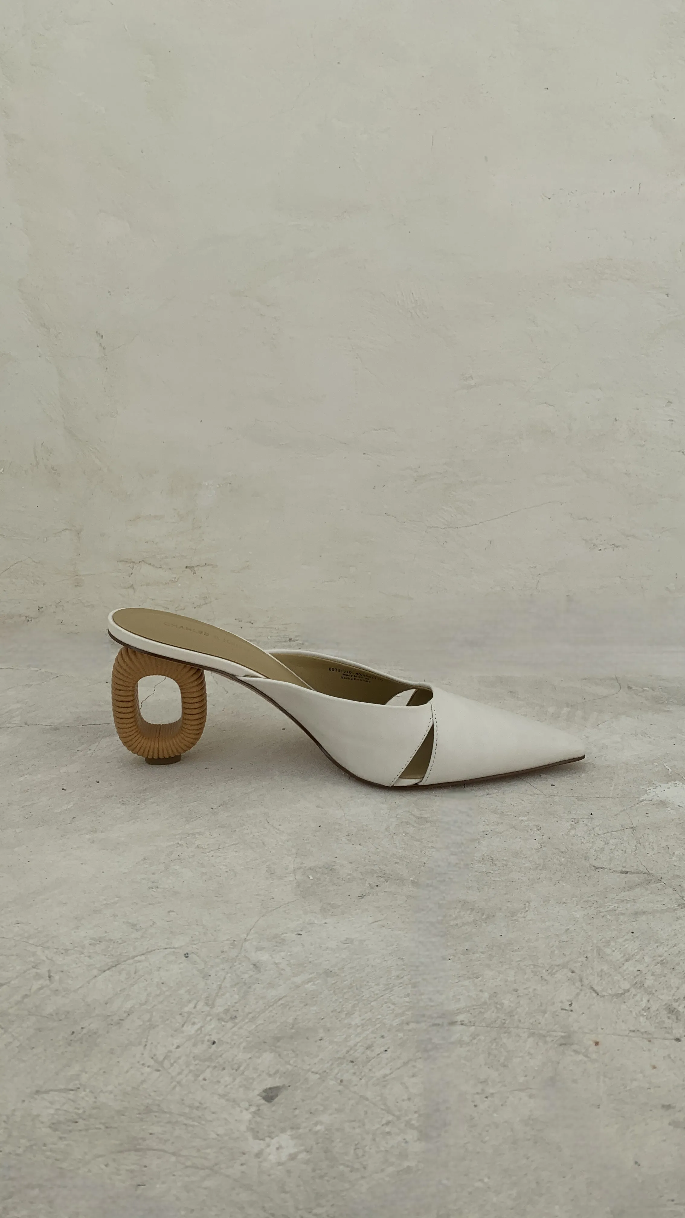 Sculptural Heel Mules