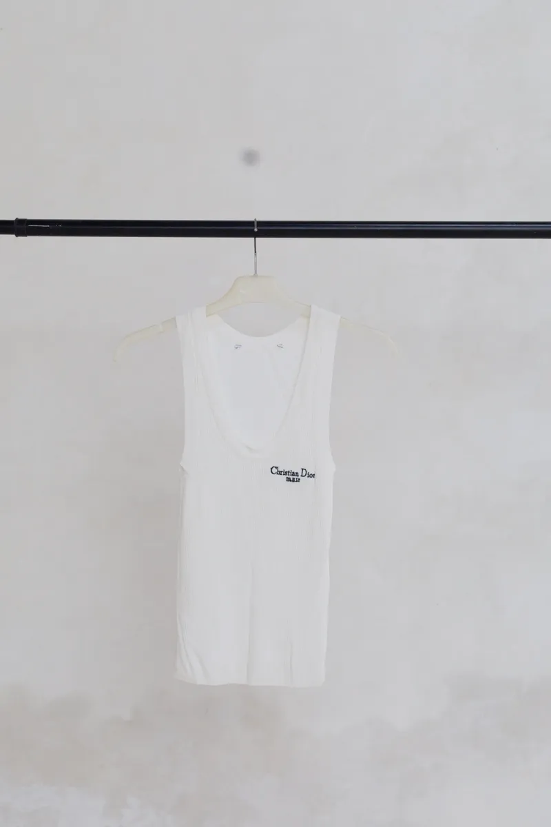 white vest with "christian dior" embroidery